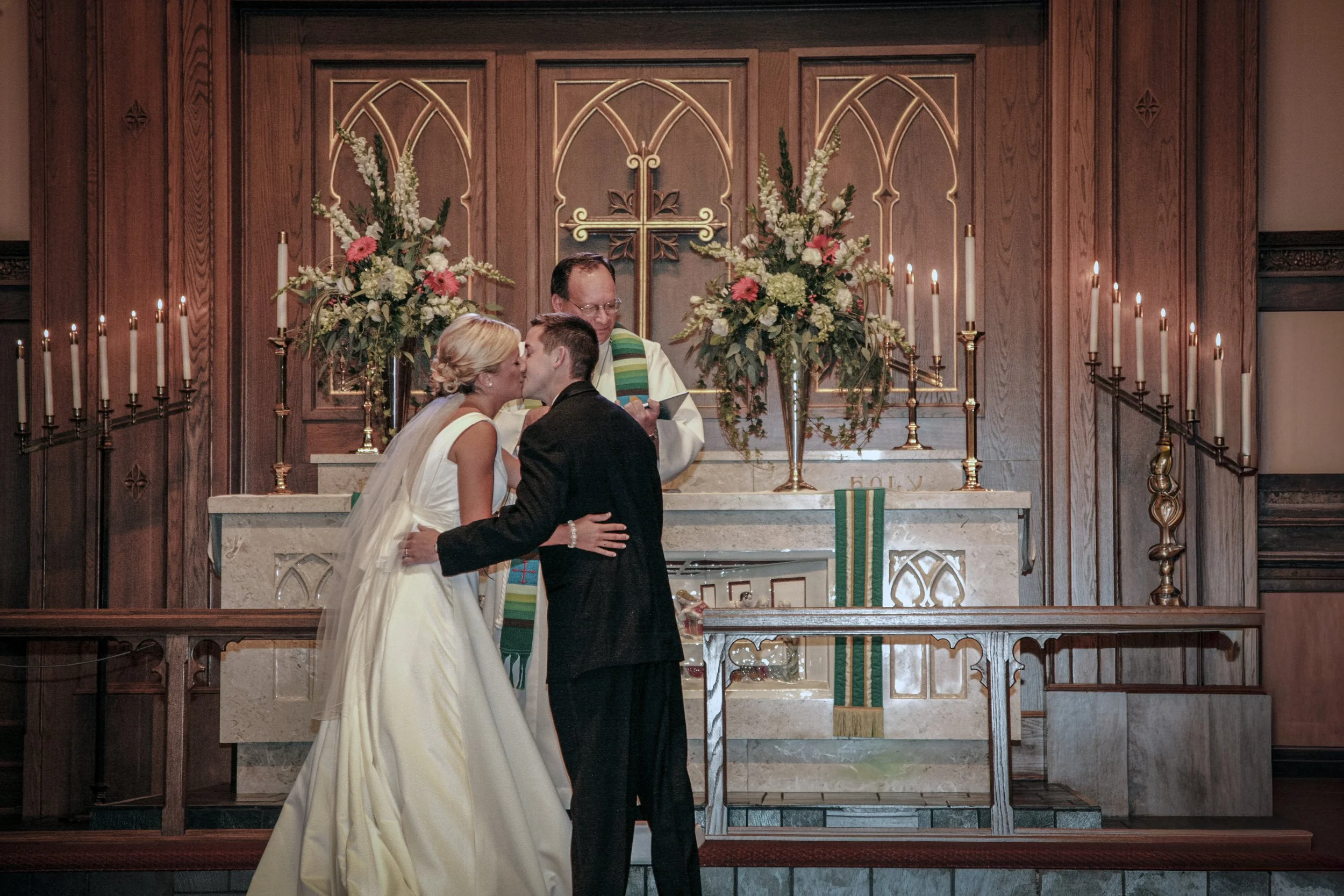 wedding photo of you may kiss the bride moment.JPG