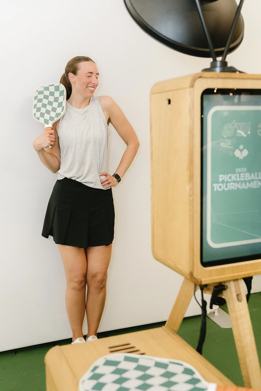 Pickleball Player Posing in Front Custom Trading Card Booth.jpg