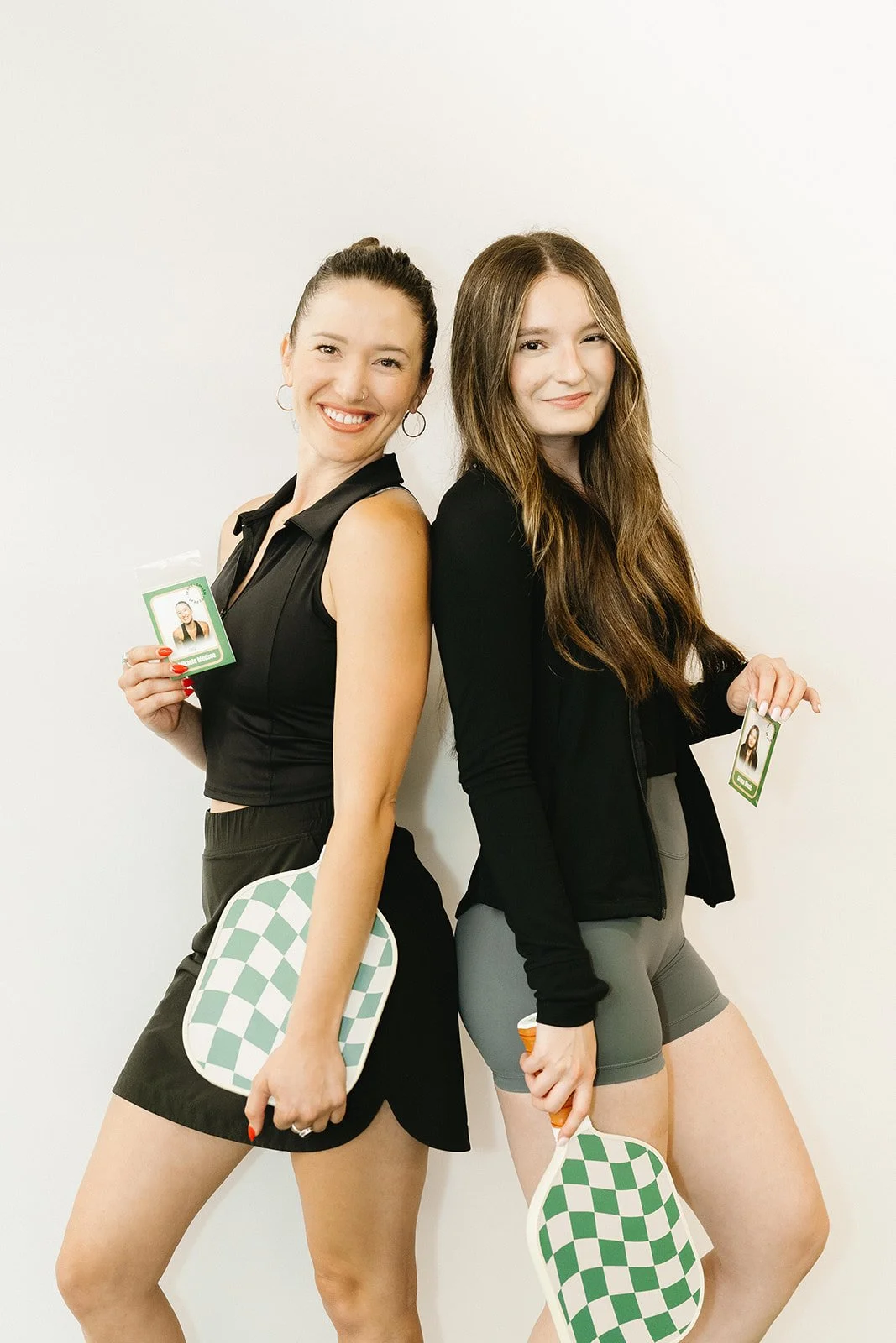 Pickleball Players Holding their Custom Trading Cards in Premium Sleeves.jpg