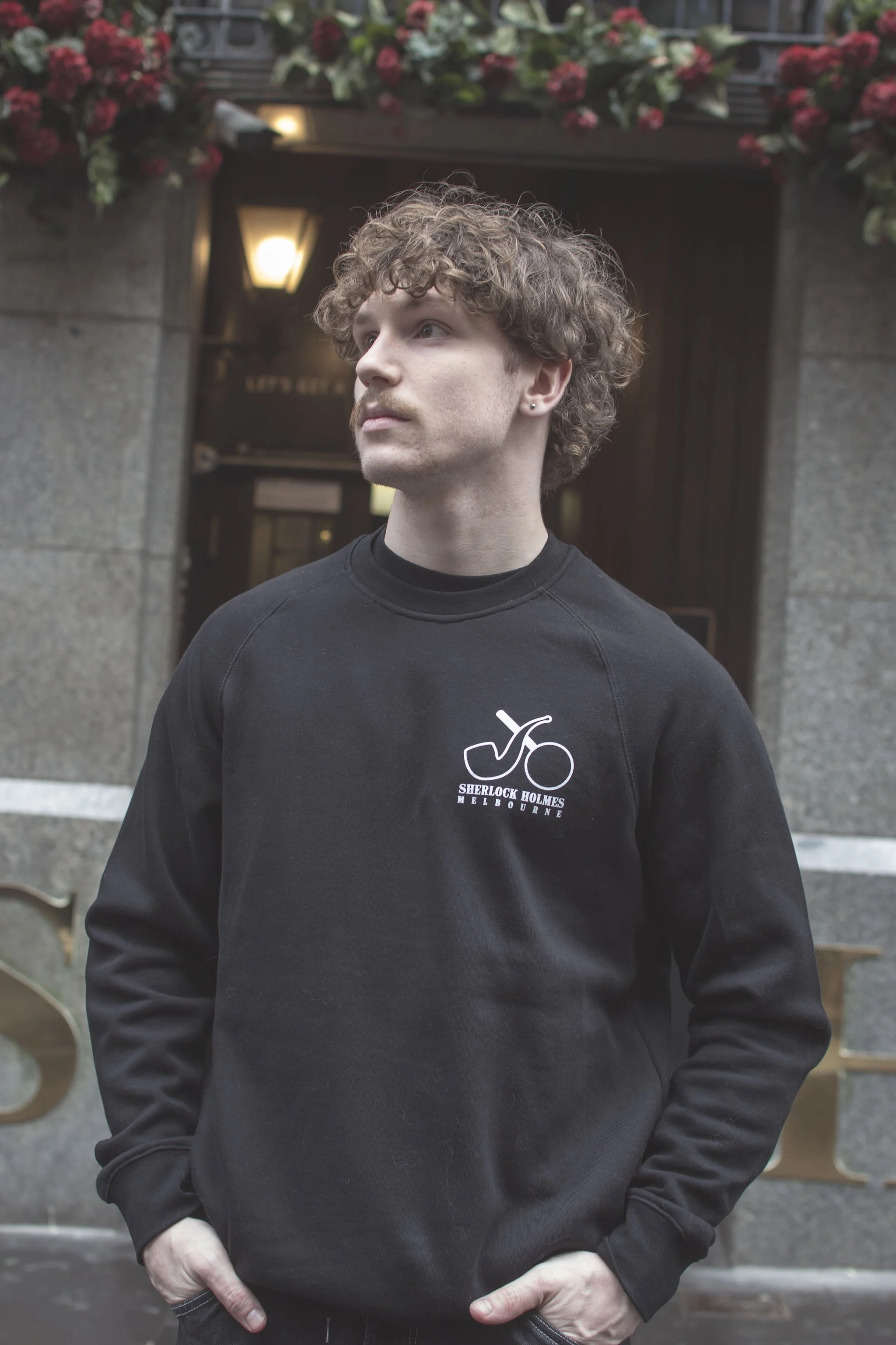 Luc wearing a custom Sherlock Holmes Crewneck Sweatshirt