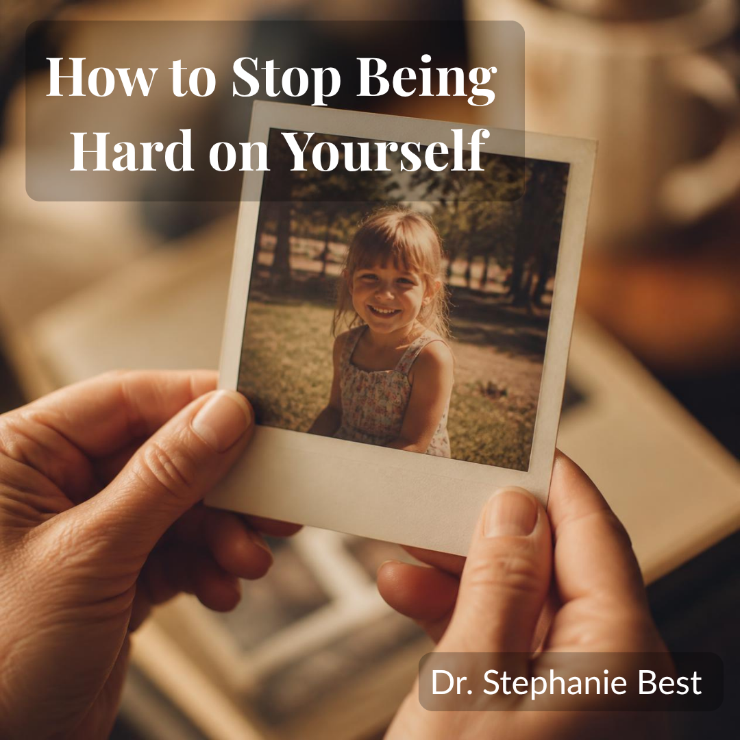Hands gently holding a childhood photo, a small comfort for when you're being hard on yourself