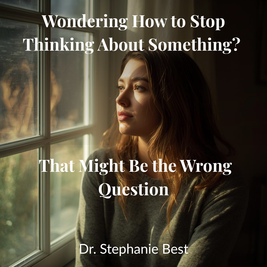 Woman gazing thoughtfully out a window — how to stop thinking about something