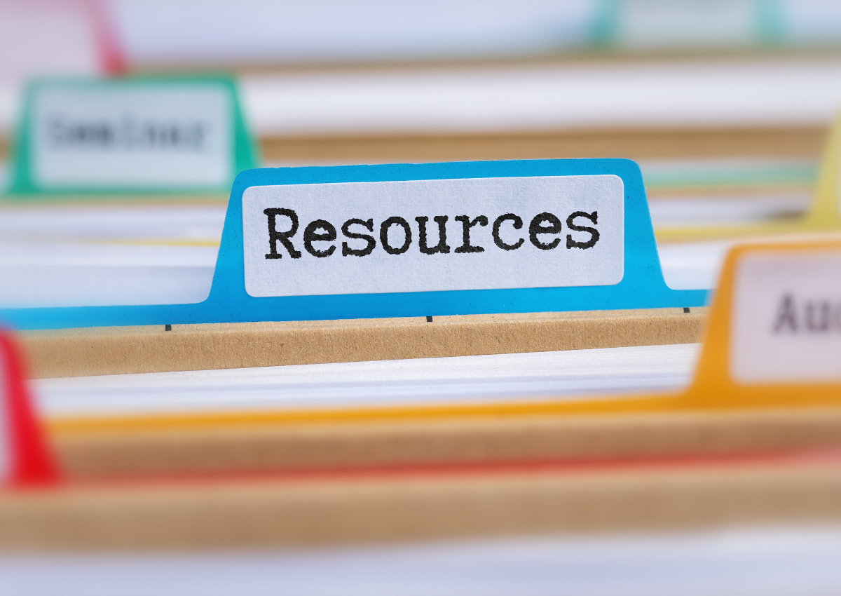 Close up of file folders with a blue tab labelled Resources.