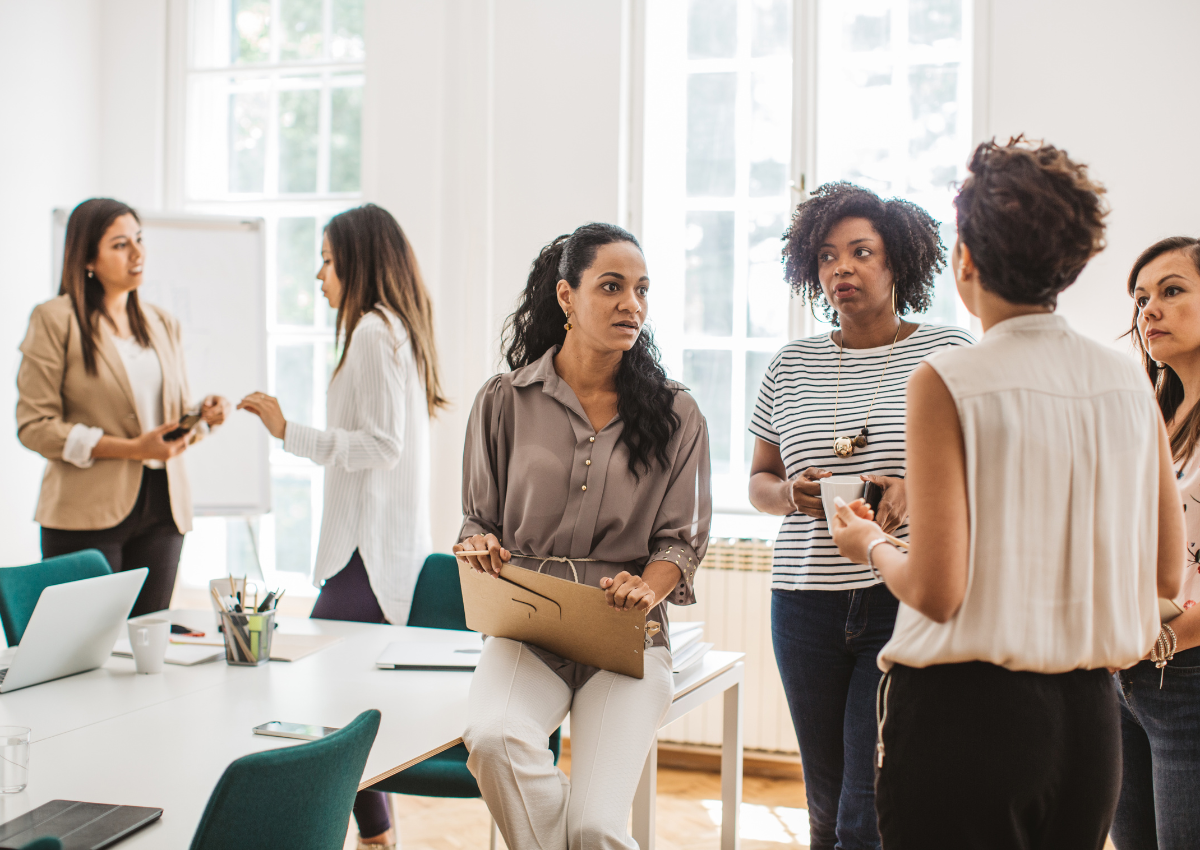 People networking at a professional development event.