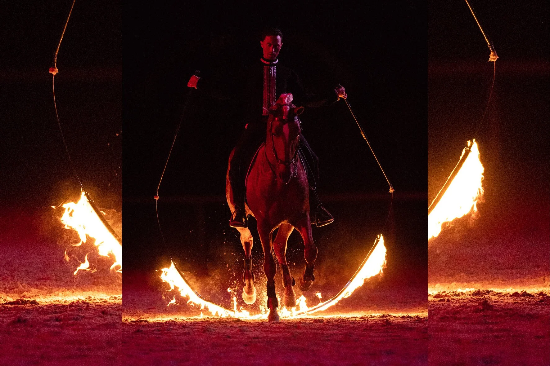 Equestrian performance featuring a horse and rider with flaming whips, set against a dark background.