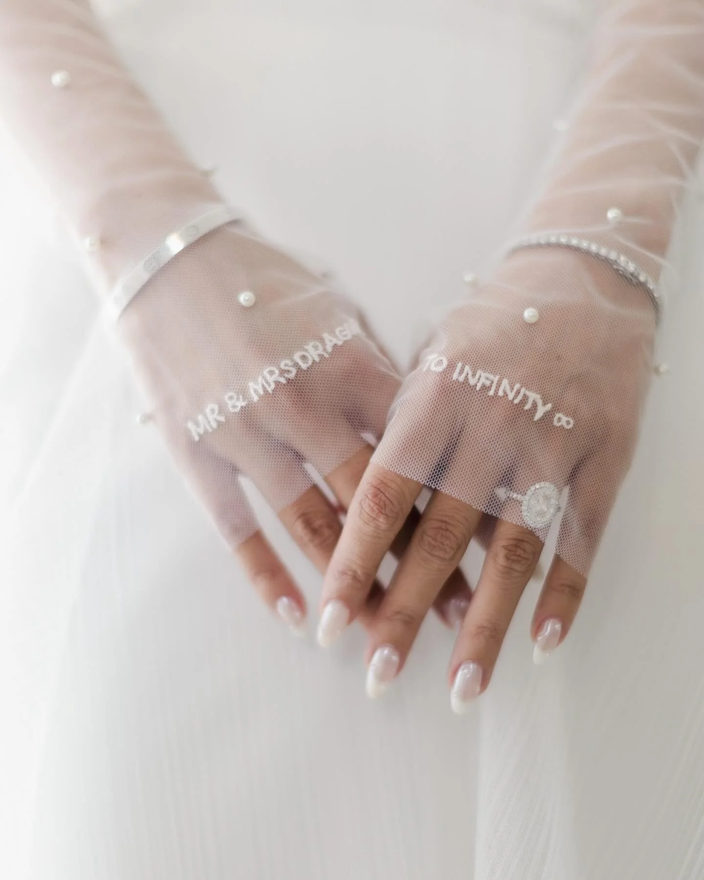 An intimate gathering with loved ones arriving from across the world. In the serene beauty of Palace de Montreux, by the lake and under the Alps, a bride from Hong Kong and a groom from Romania exchanged their vows. These delicate gloves, embroidered