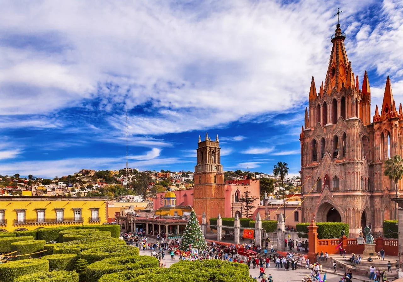 San Miguel de Allende on a clear day with crowds.