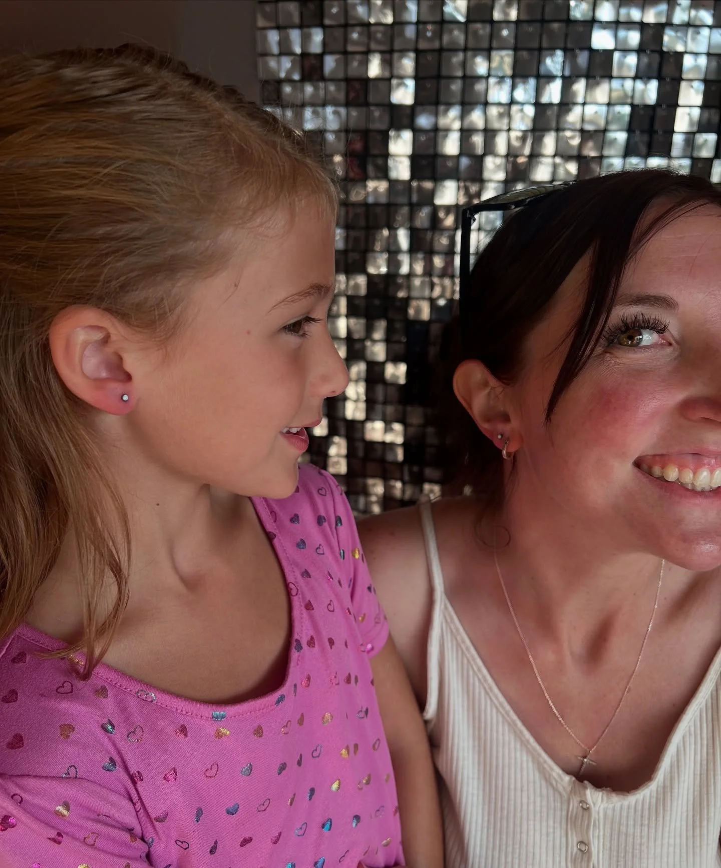 We had the absolute cutest crew in yesterday! 💖 Josie was SO brave while her aunt, mom and grandmother cheered her on every step of the way. She and her Aunt Jennifer got new matching earrings! Jennifer went first while Josie watched. When it was he