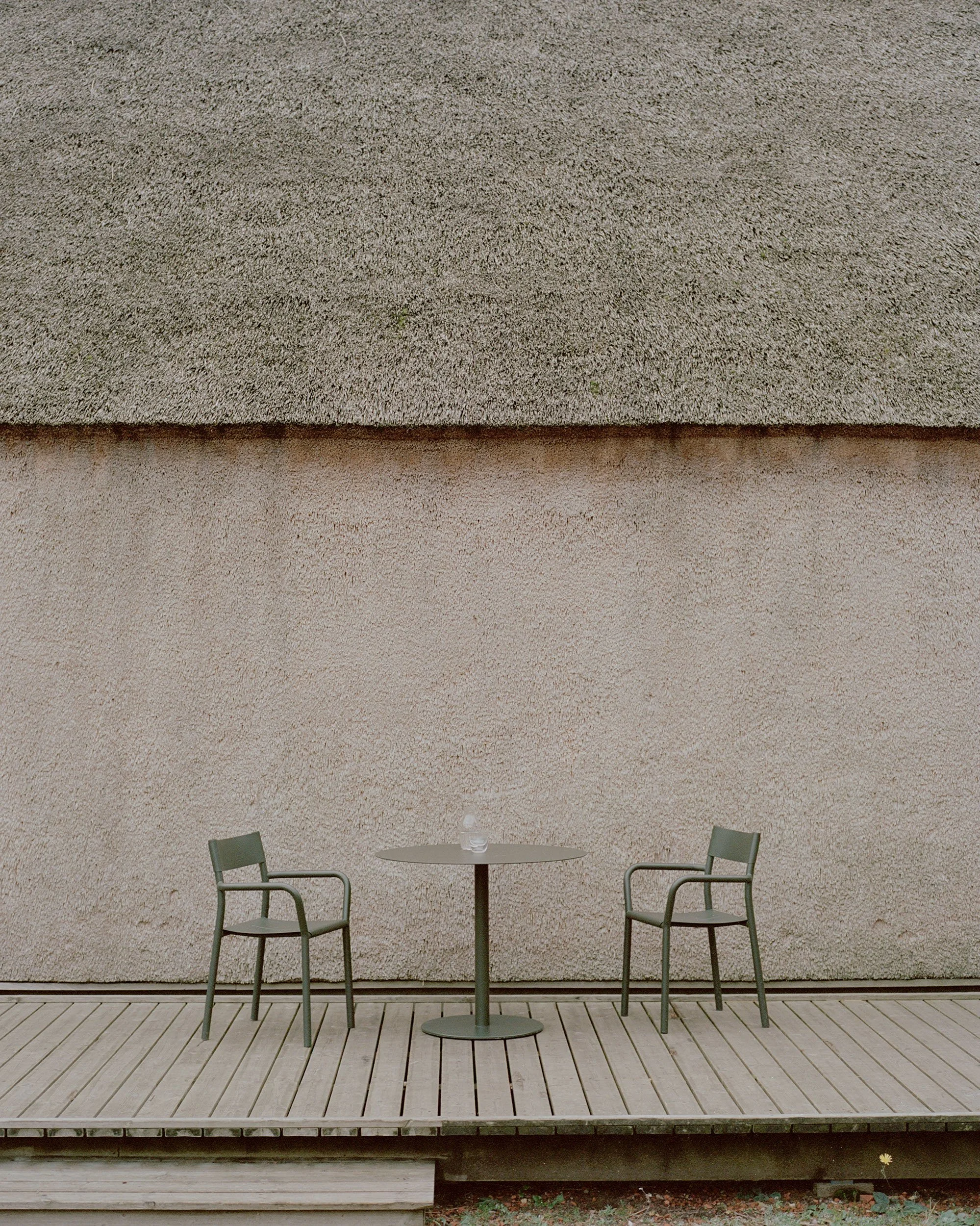 New-Works_Lifestyle_West-Coast_43230_42520_May-Bistro-Table-Round_May-Armchair_Dark-Green_1.jpeg