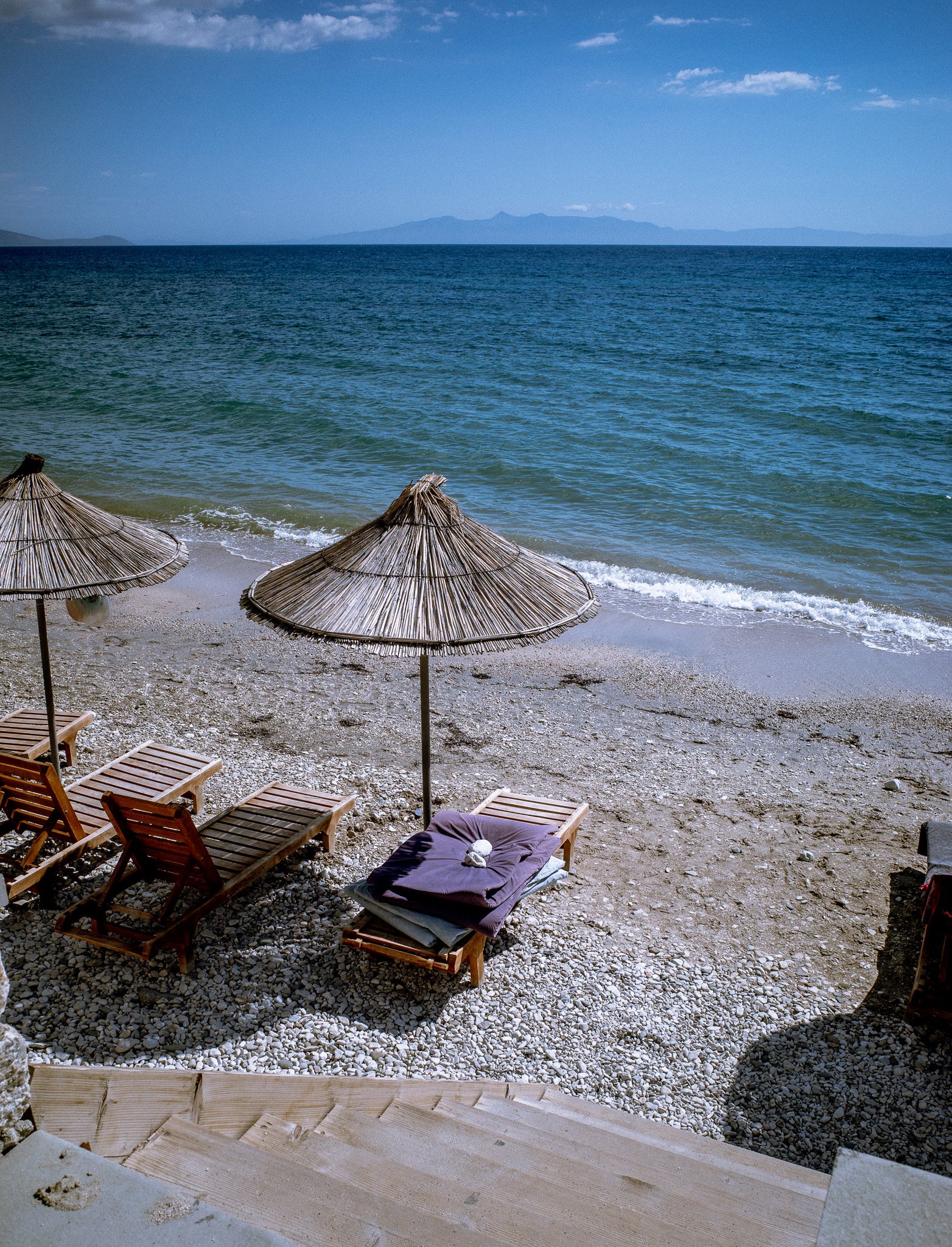 Purple towel and beach chair - Kodak ColorPlus 200 Lightroom Preset