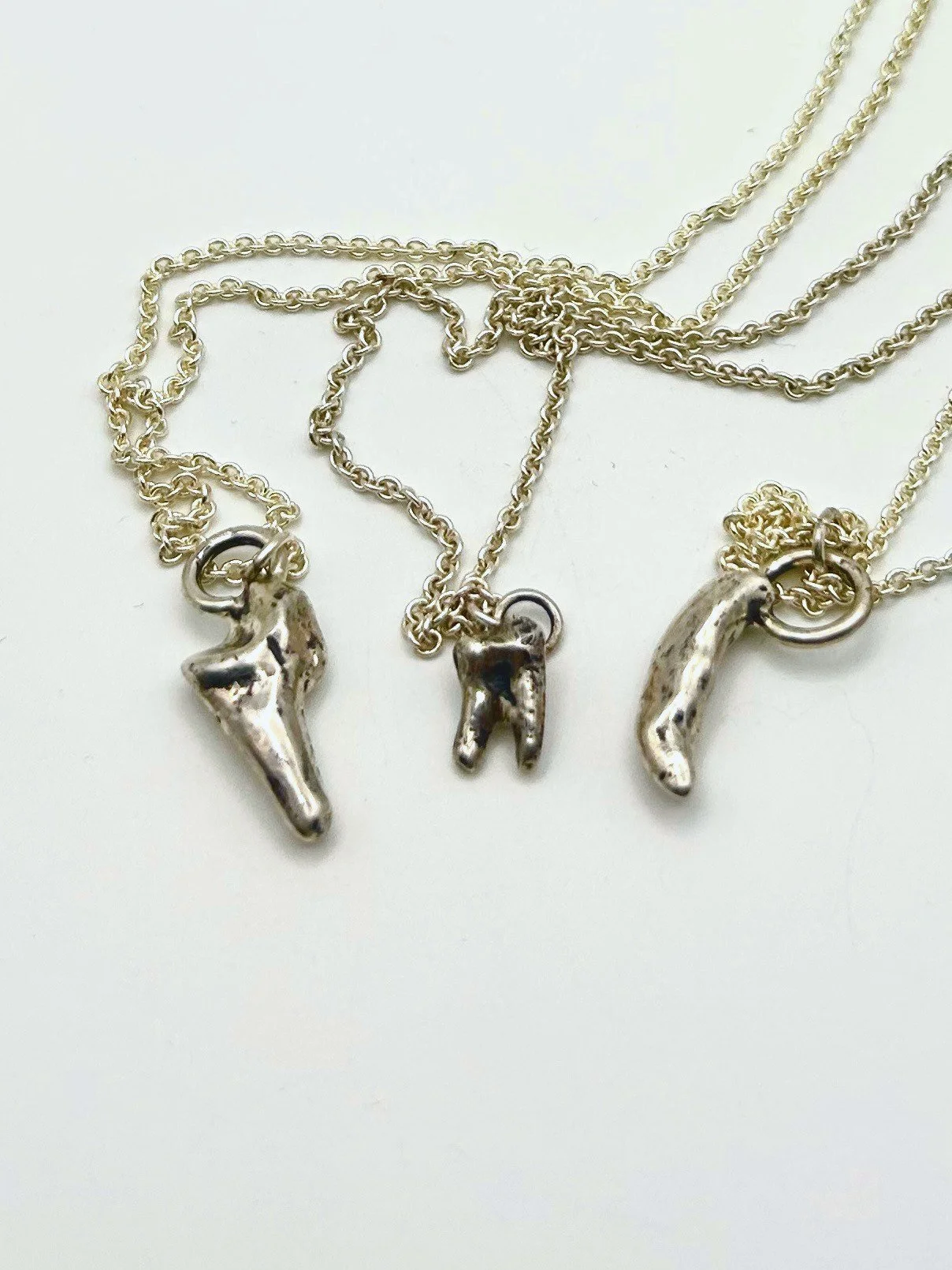 Sterling silver castings of dog teeth