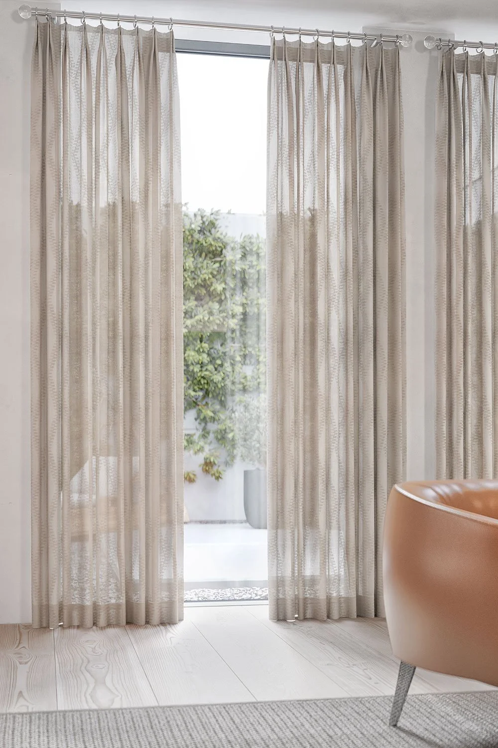 Pleated drapery framing a Gulf-view opening on Perdido Key