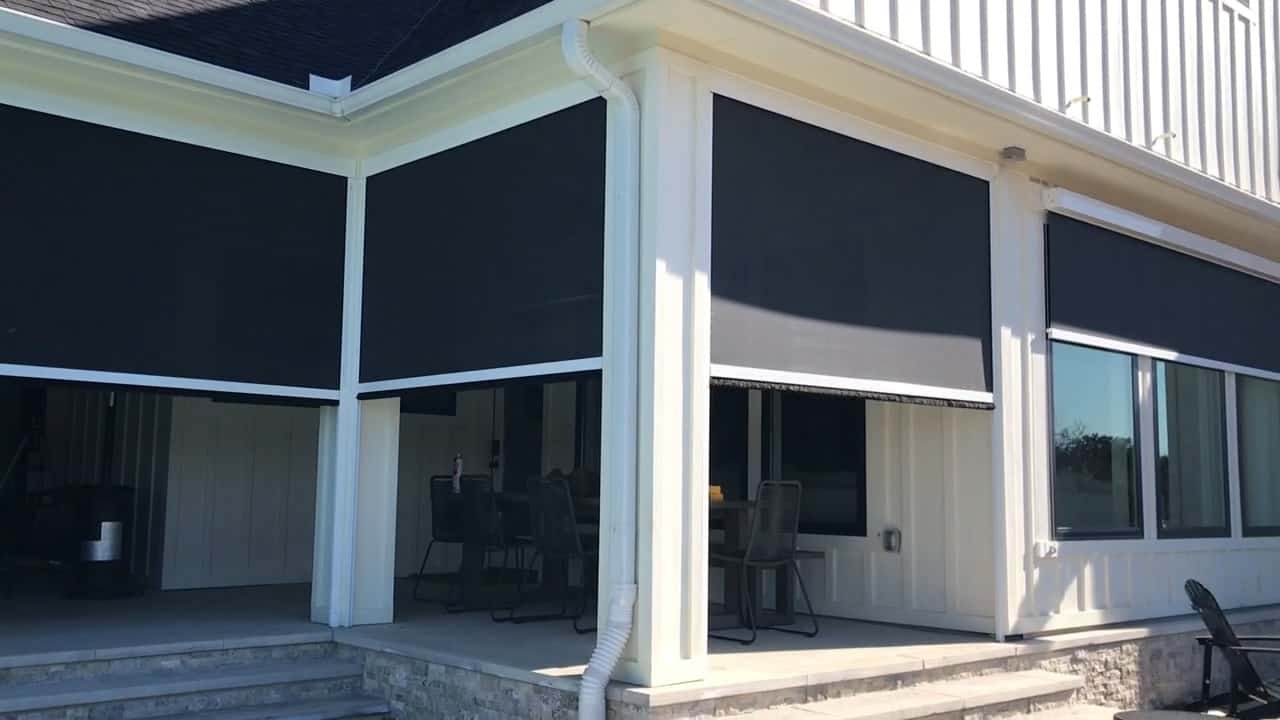 Exterior solar shades for a river-facing Bon Secour porch