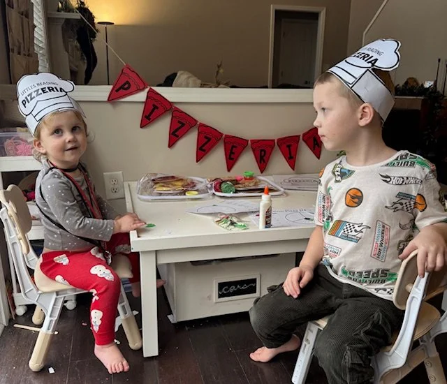 littles reading pic of kids and pizzeria.jpeg