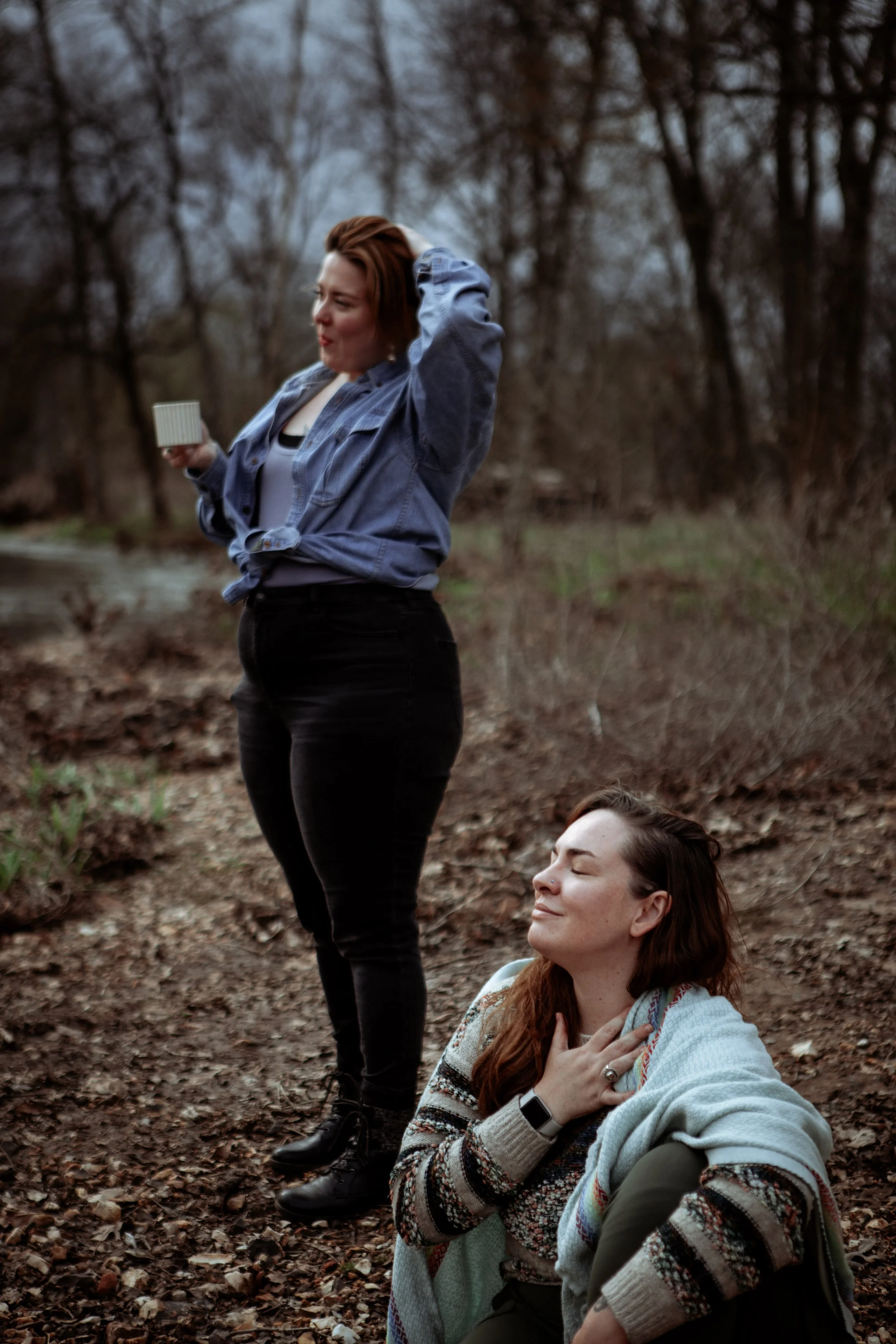 women at ease enjoying themselves in the woods 