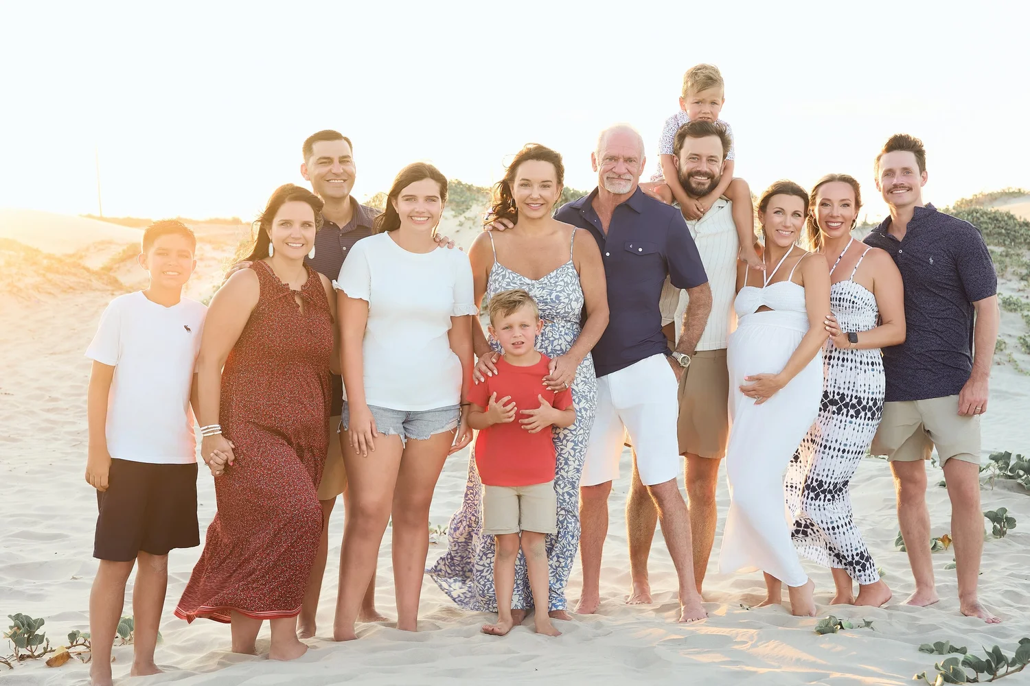 Extended family portrait photographed in the South Padre Island sand dunes