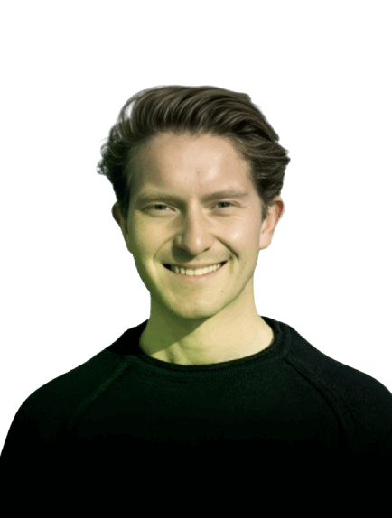 Smiling person wearing a dark shirt against a transparent background.