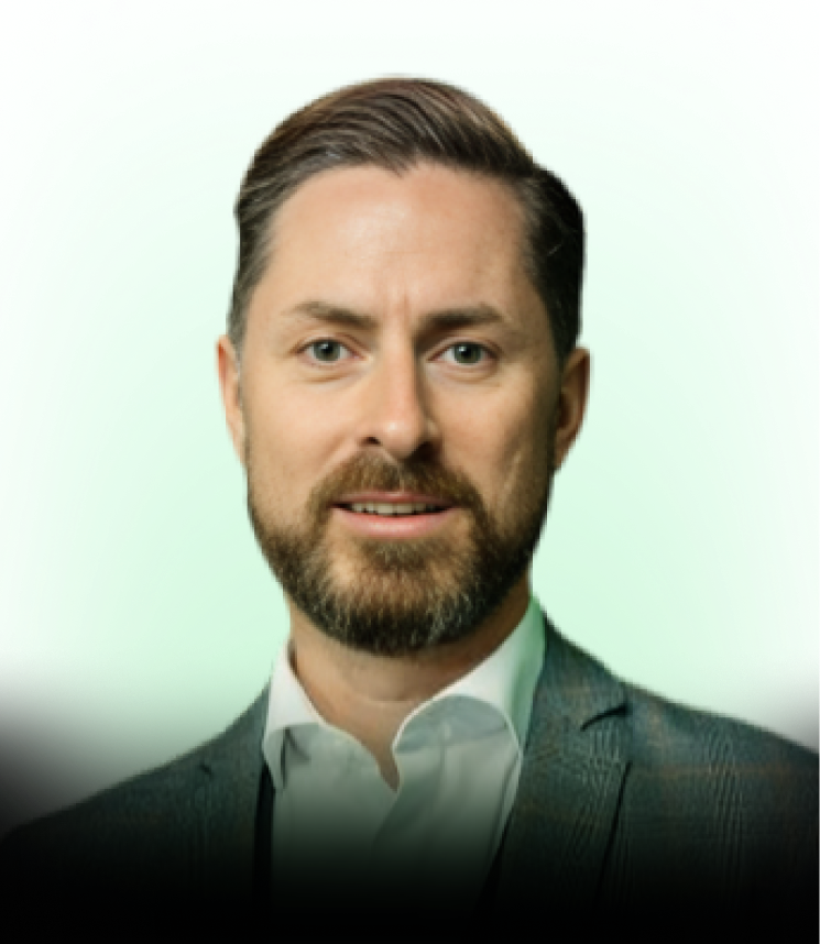 Man with beard in suit with green background