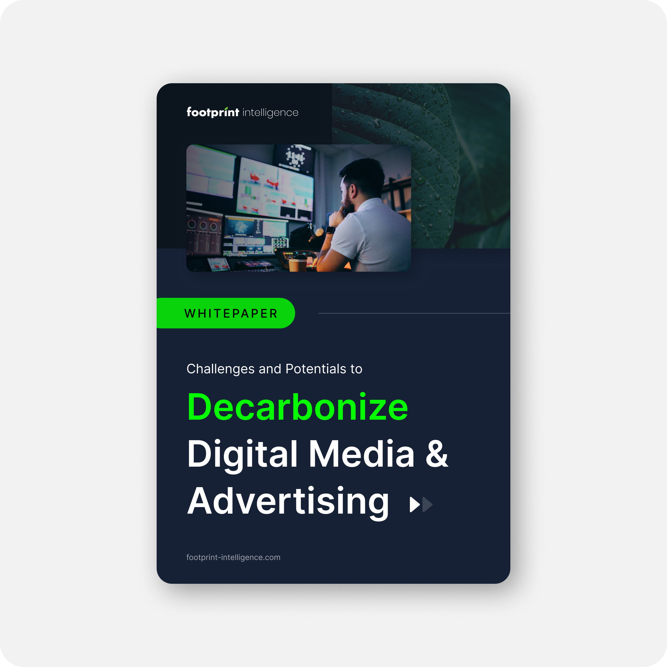 Whitepaper cover by Footprint Intelligence titled 'Challenges and Potentials to Decarbonize Digital Media & Advertising.' The cover features a man working at a desk with multiple monitors and a green leaf as part of the background design.