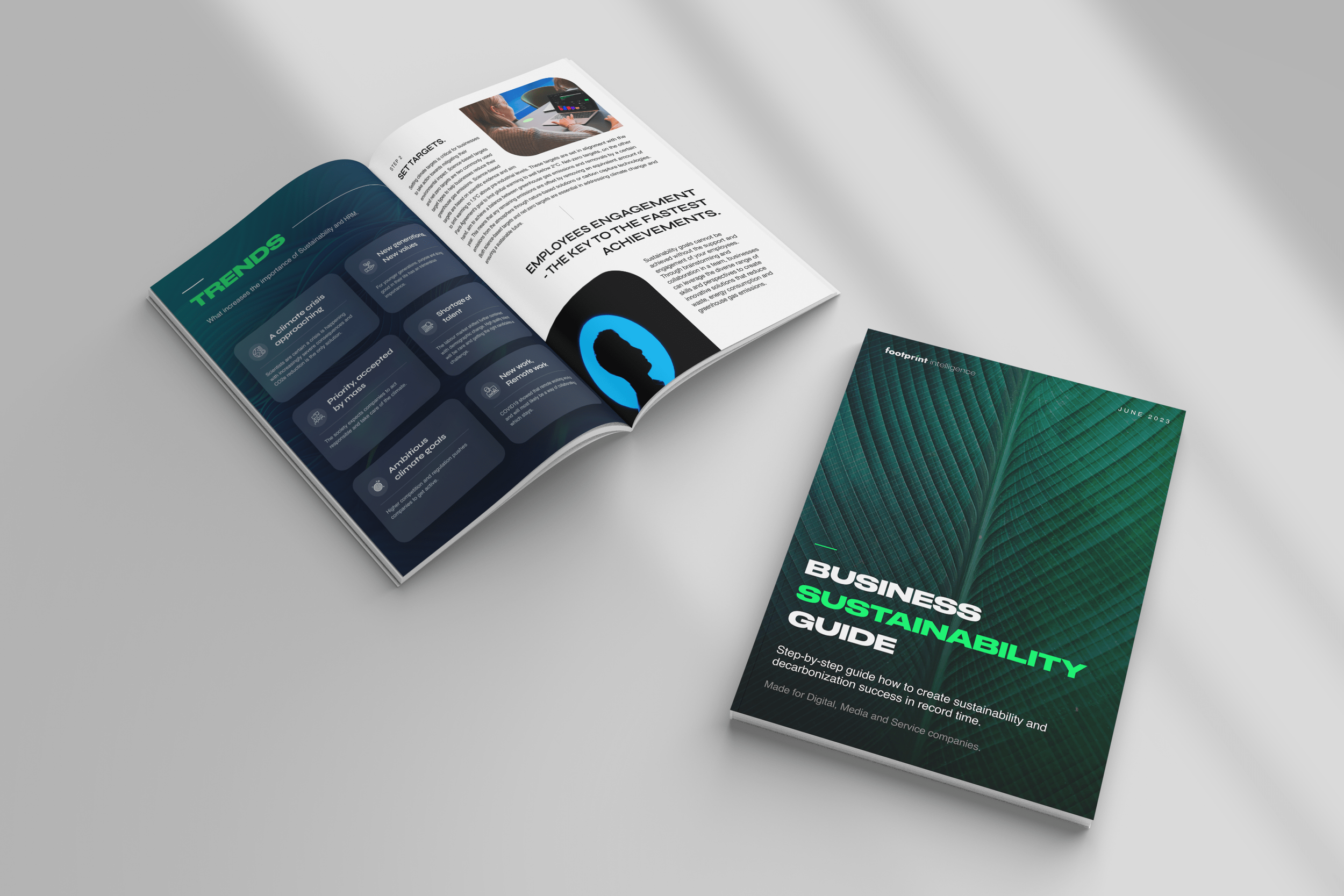 An open booklet and a closed booklet on a light gray surface. The closed booklet features a green leaf design with the title "Business Sustainability Guide". The open booklet shows pages with text, images, and sections labeled "Trends" and "Set Targets". The layout is clean and modern with a focus on sustainability.