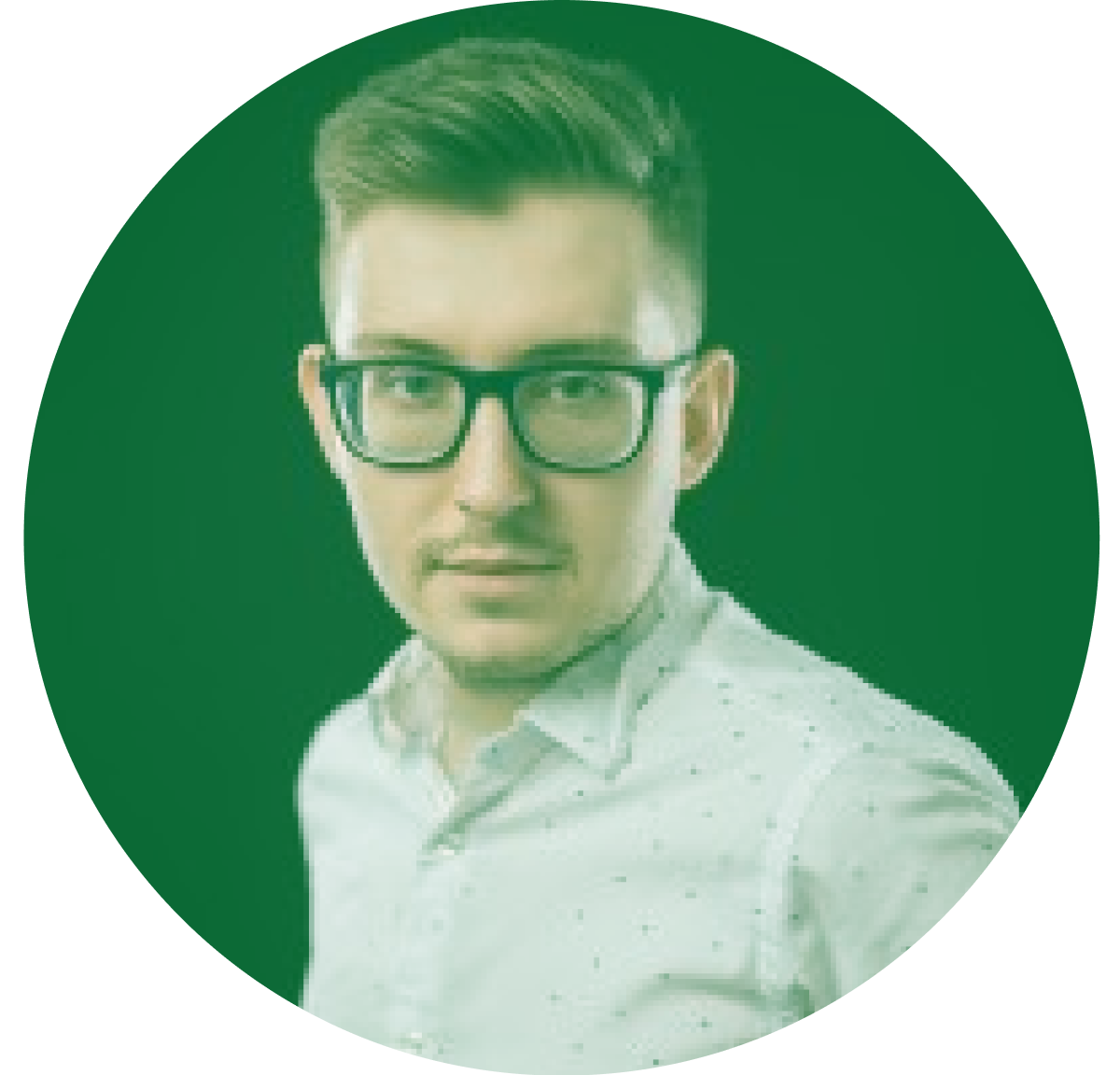 Man wearing glasses and a white shirt with small patterns, against a green background.