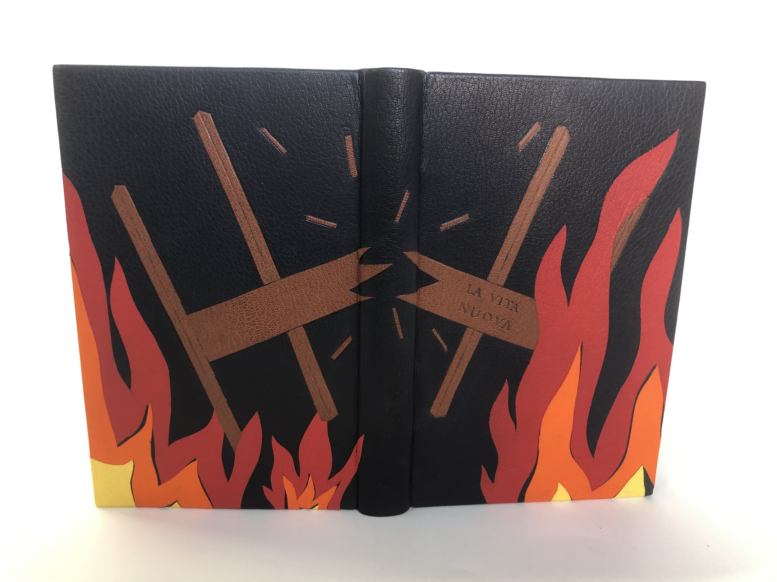 Fine binding of La Vita Nuova by Dante. Design done with onlays and smoke tooling.