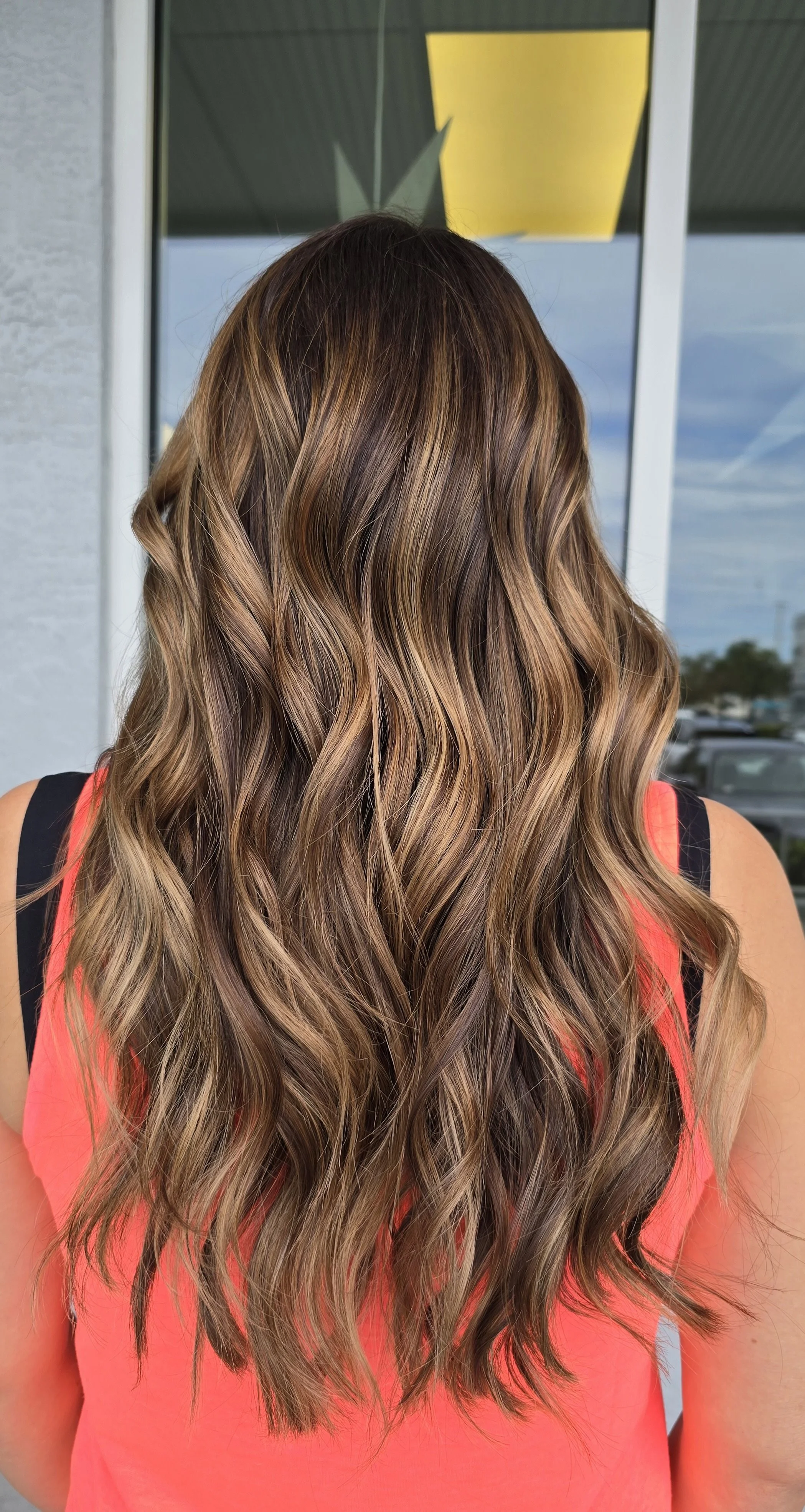 long brown wavy hair with low auburn low lights