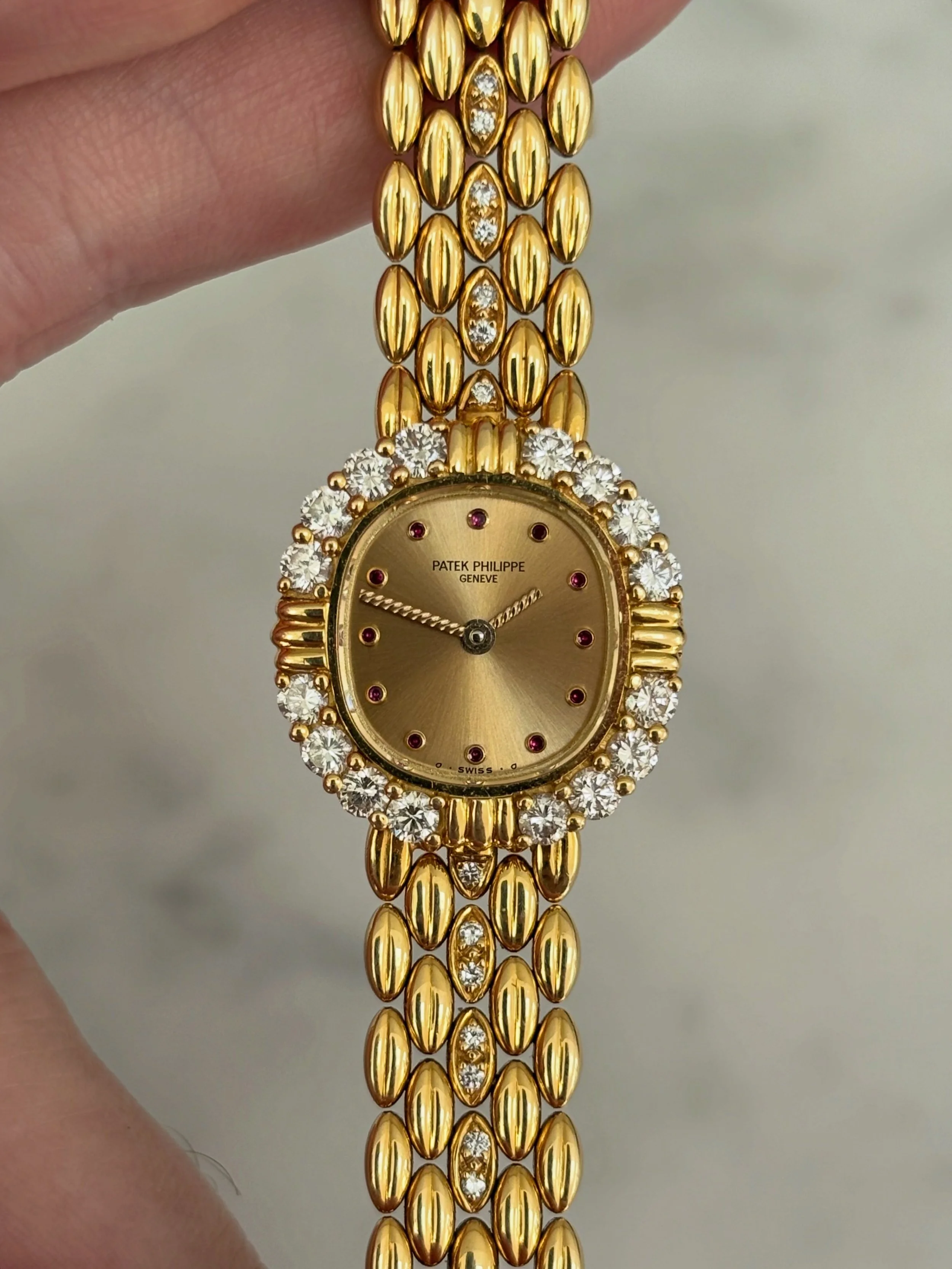 Patek Philippe Mini Ellipse Yellow Gold Diamond Bezel & Ruby Set Indexes ref. 4774/2J