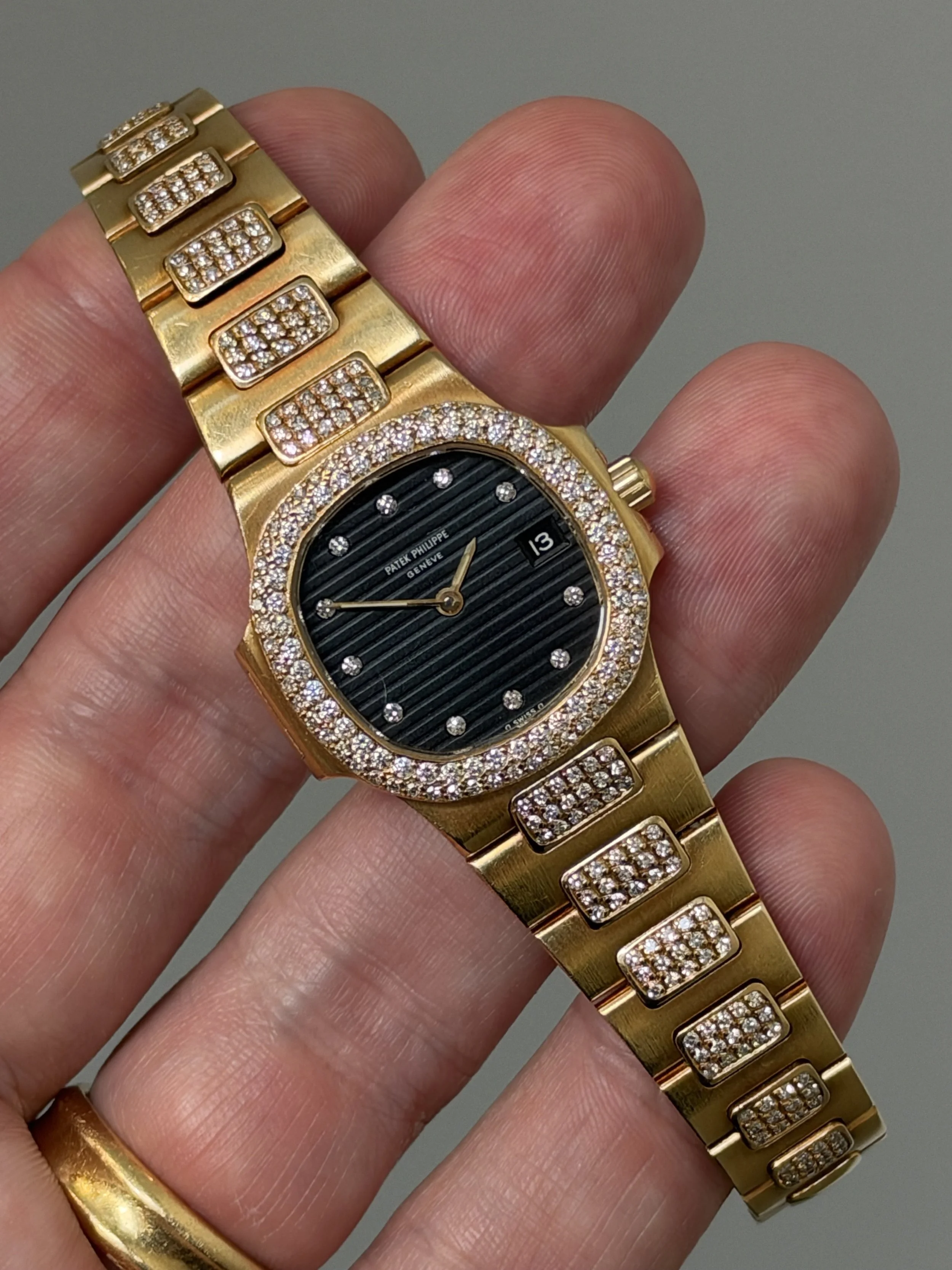 Patek Philippe Mini Nautilus Yellow Gold Diamond Set, Navy Dial & Diamond Indexes ref. 4700/5