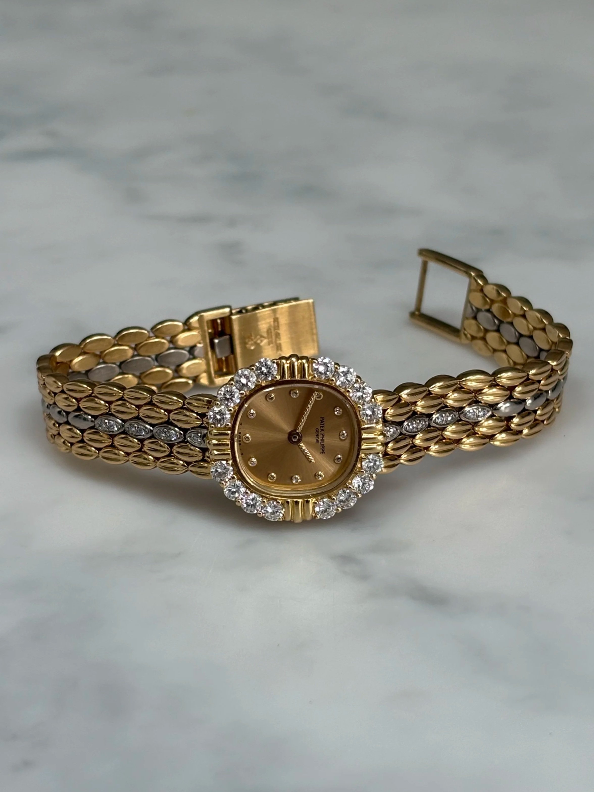 Patek Philippe Mini Ellipse Yellow & White Gold Diamond Bezel & Diamond Set Indexes ref. 4774/2J w/ Patek Service Doc & Pouch