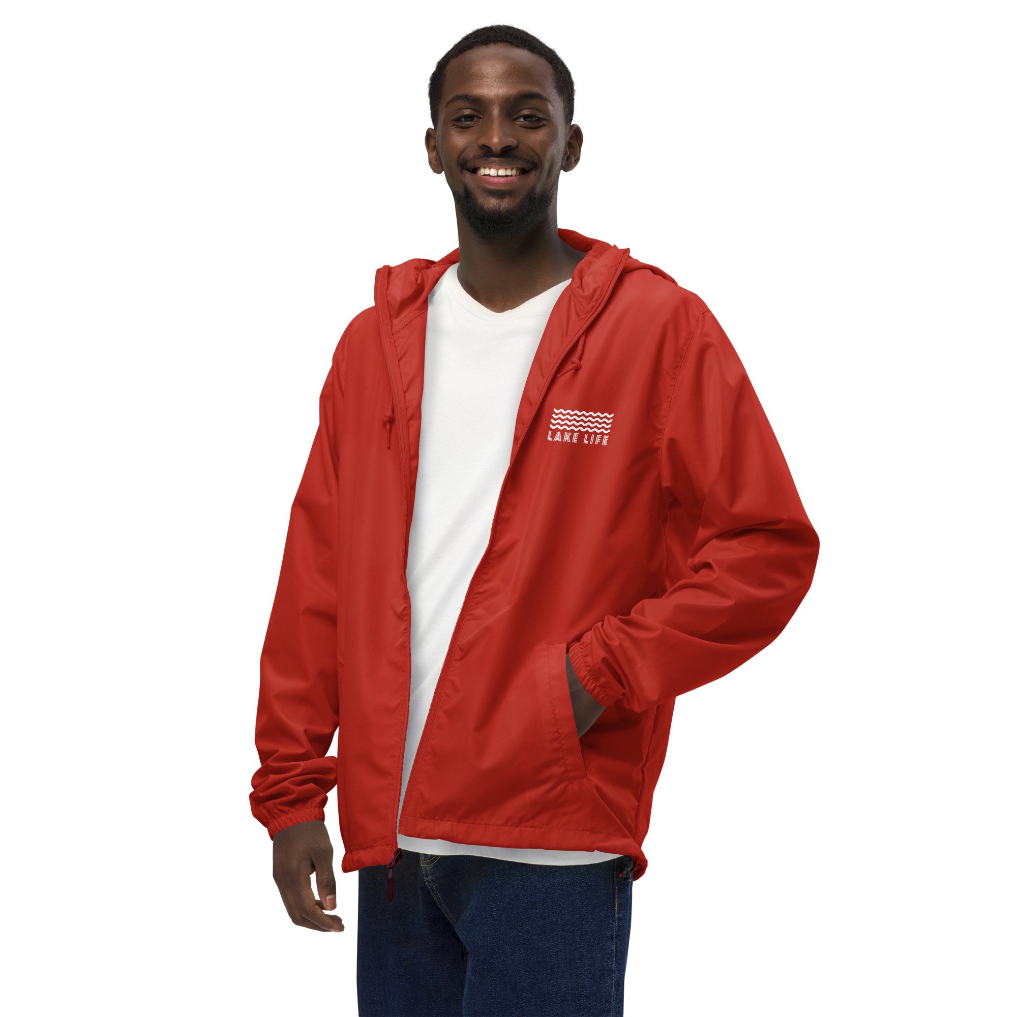 man wearing a red windbreaker with zipper and the words lake life in white with waves above on the upper left chest