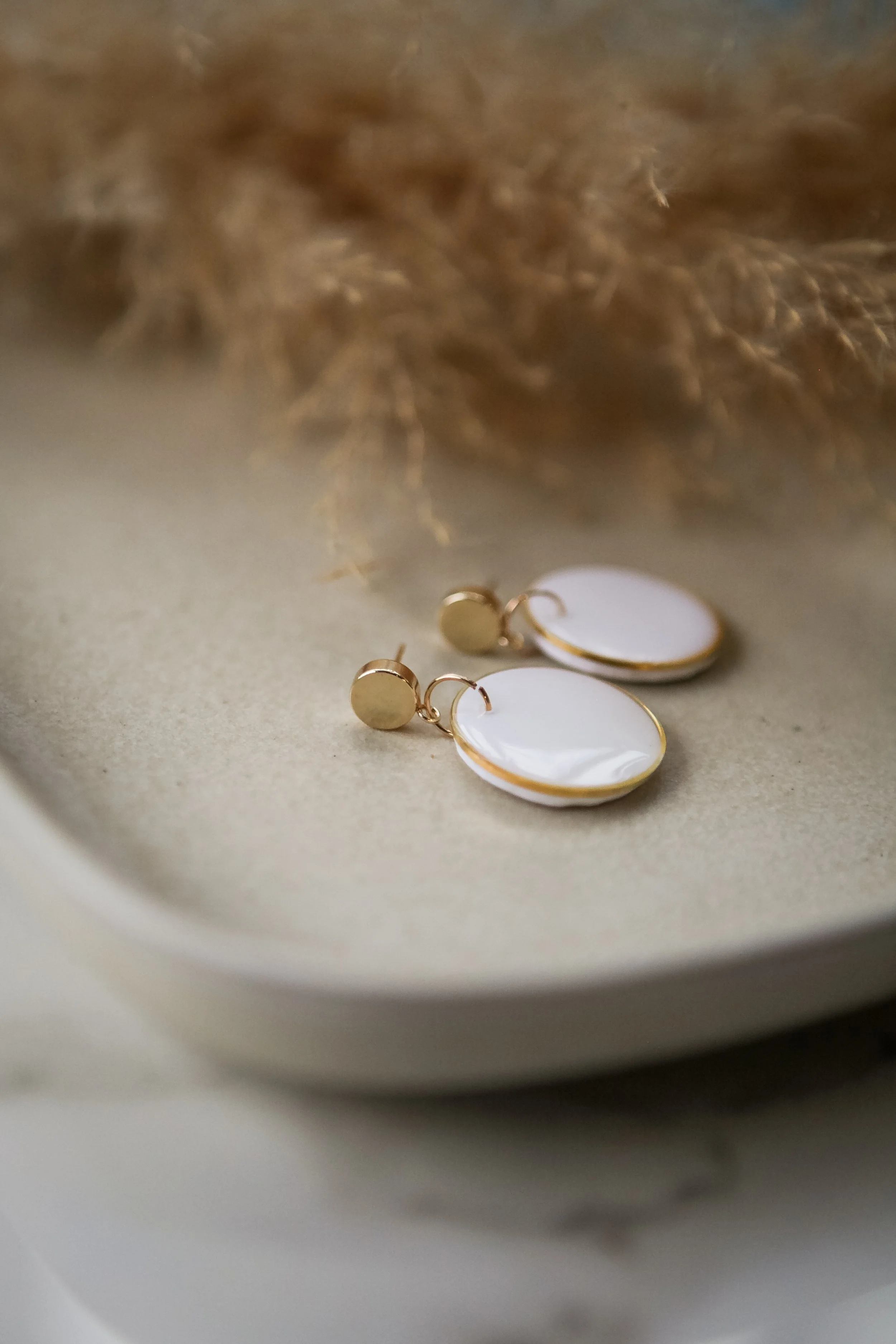 white circle gold bezel gold stud2.jpg