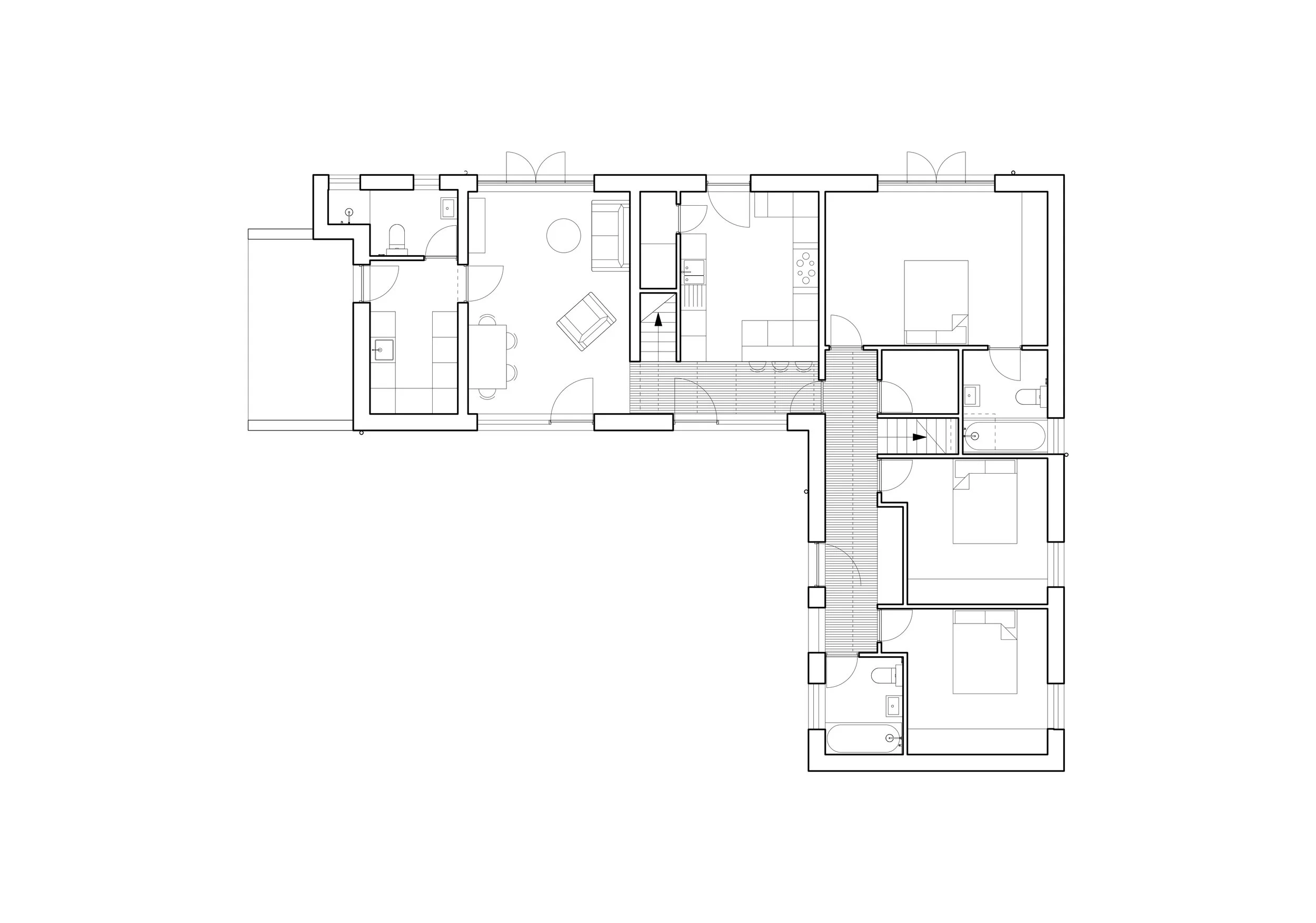 Barn conversion. Architectural floor plan of a residential apartment showing rooms, walls, doors, and furniture layout.