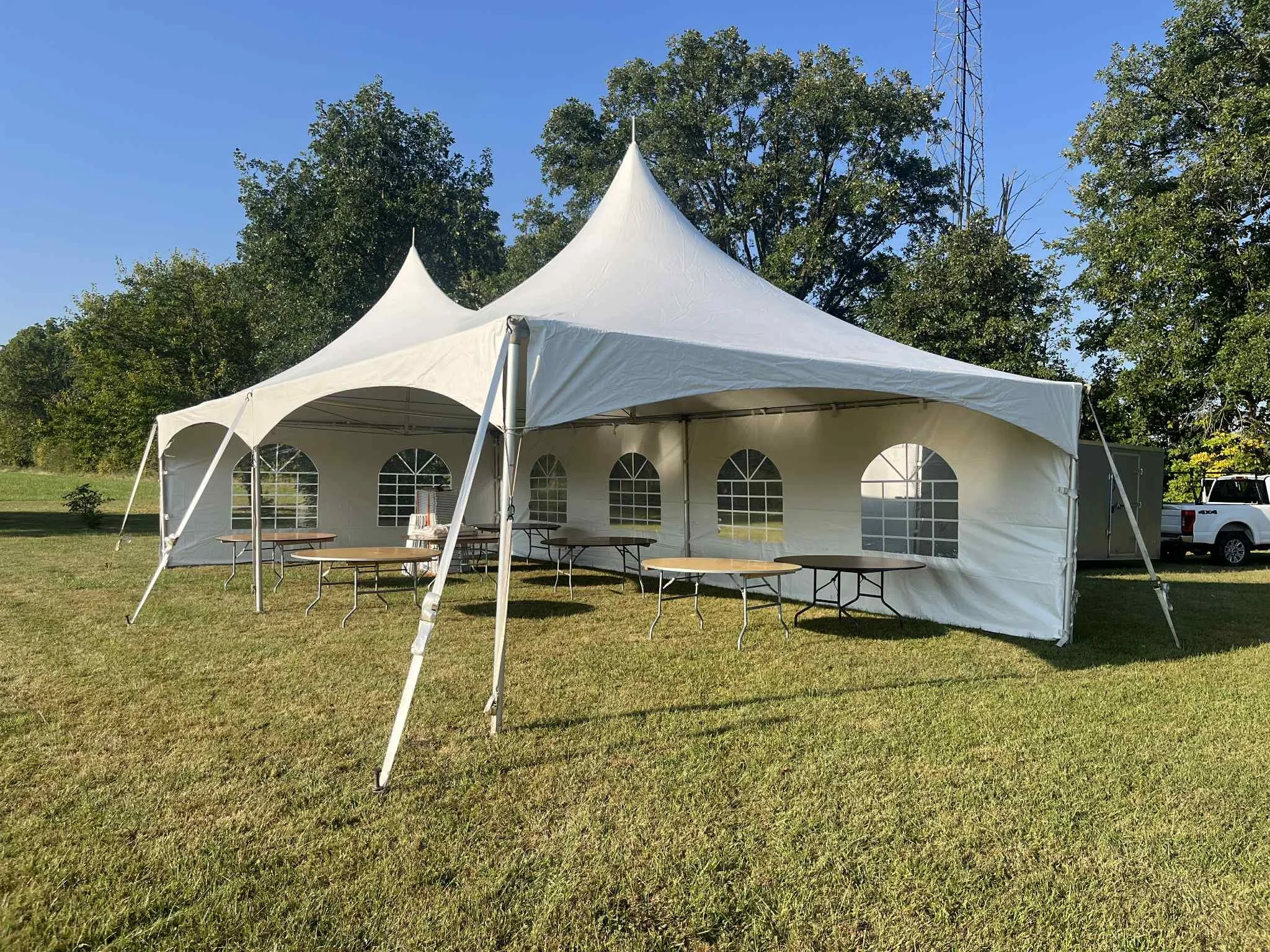 20x40 high peak frame tent rental in Avalon of Fishers backyard for large event and wedding setup