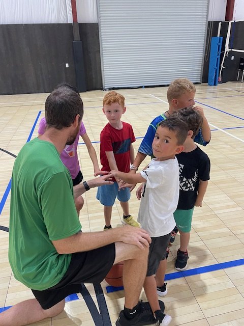 Basketball huddle kids 1st and 2nd.jpg