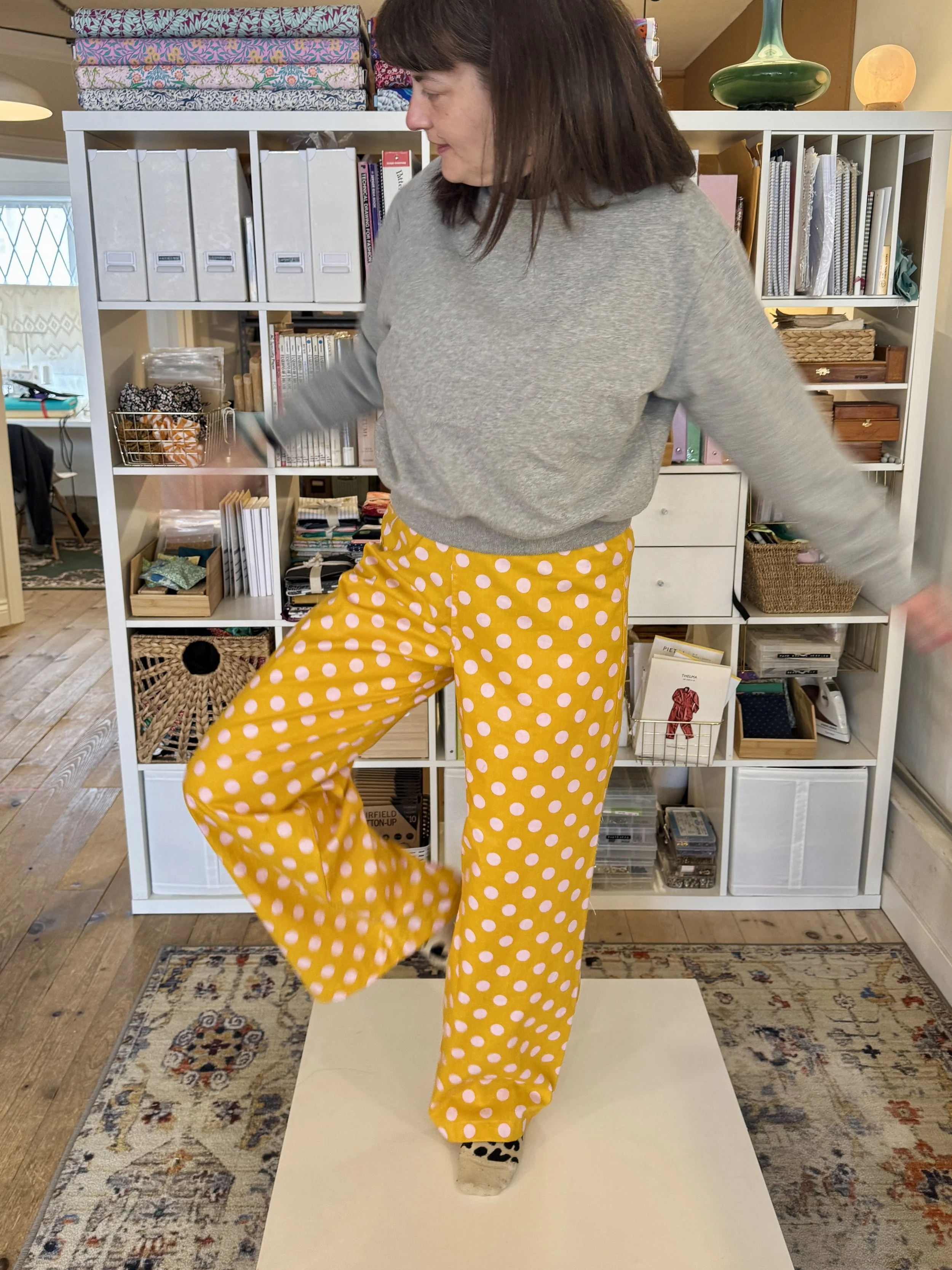 bran wearing polka dot lounge pants