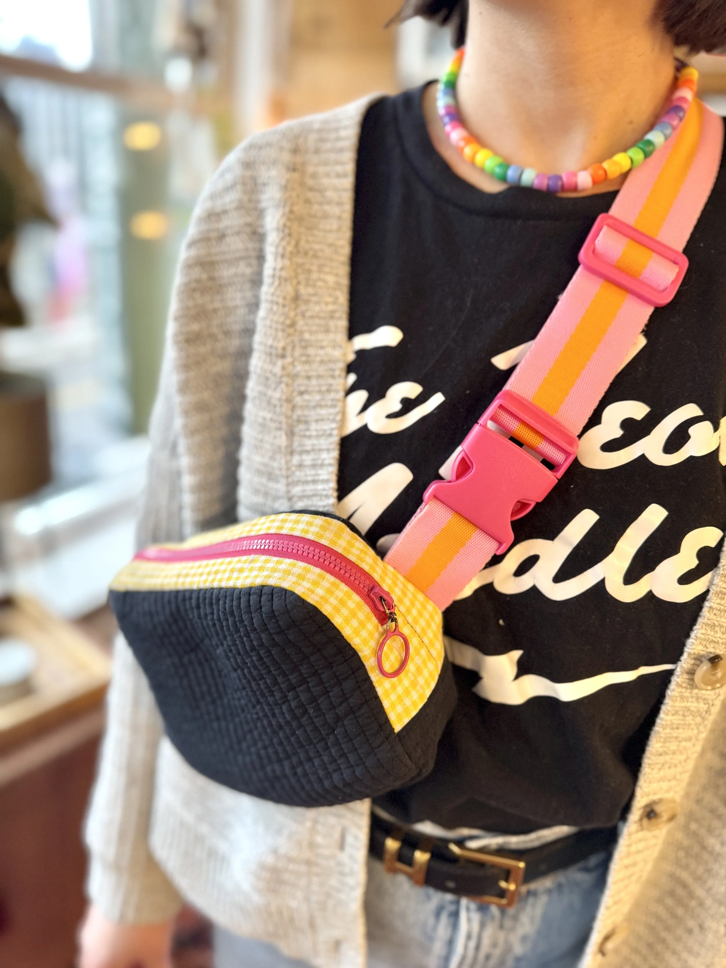 Alex is wearing the cross body bag 