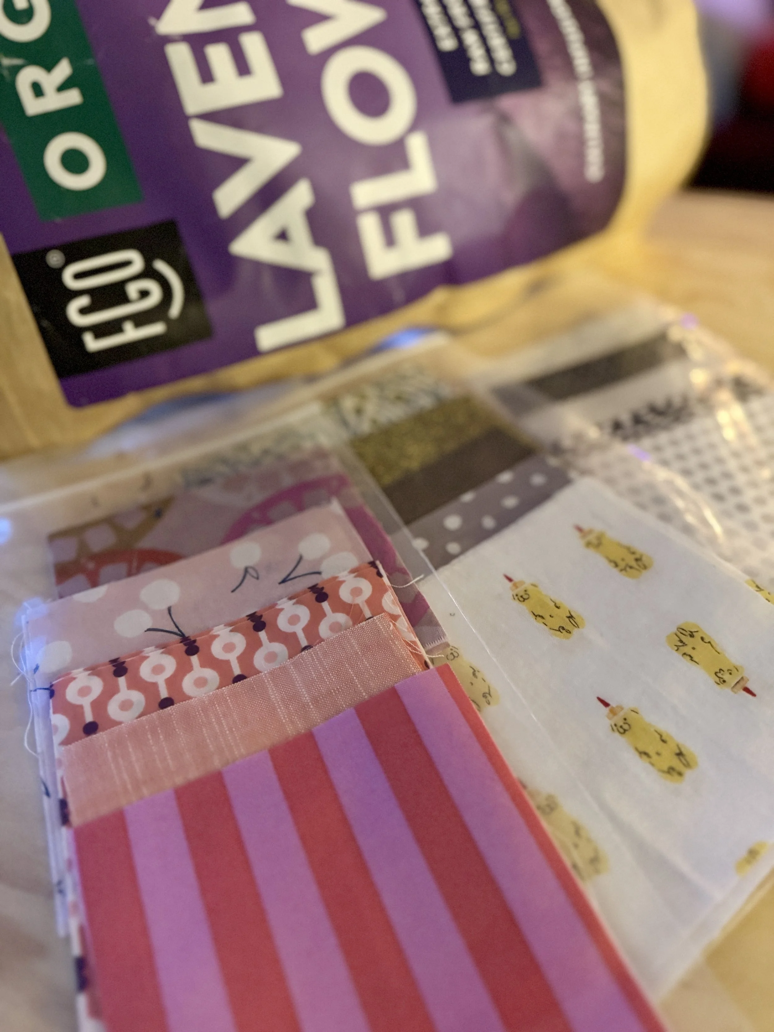 Close-up of a colorful package of Kellogg's Froot Loops cereal and a collection of decorative sticky notes in various colors and patterns.