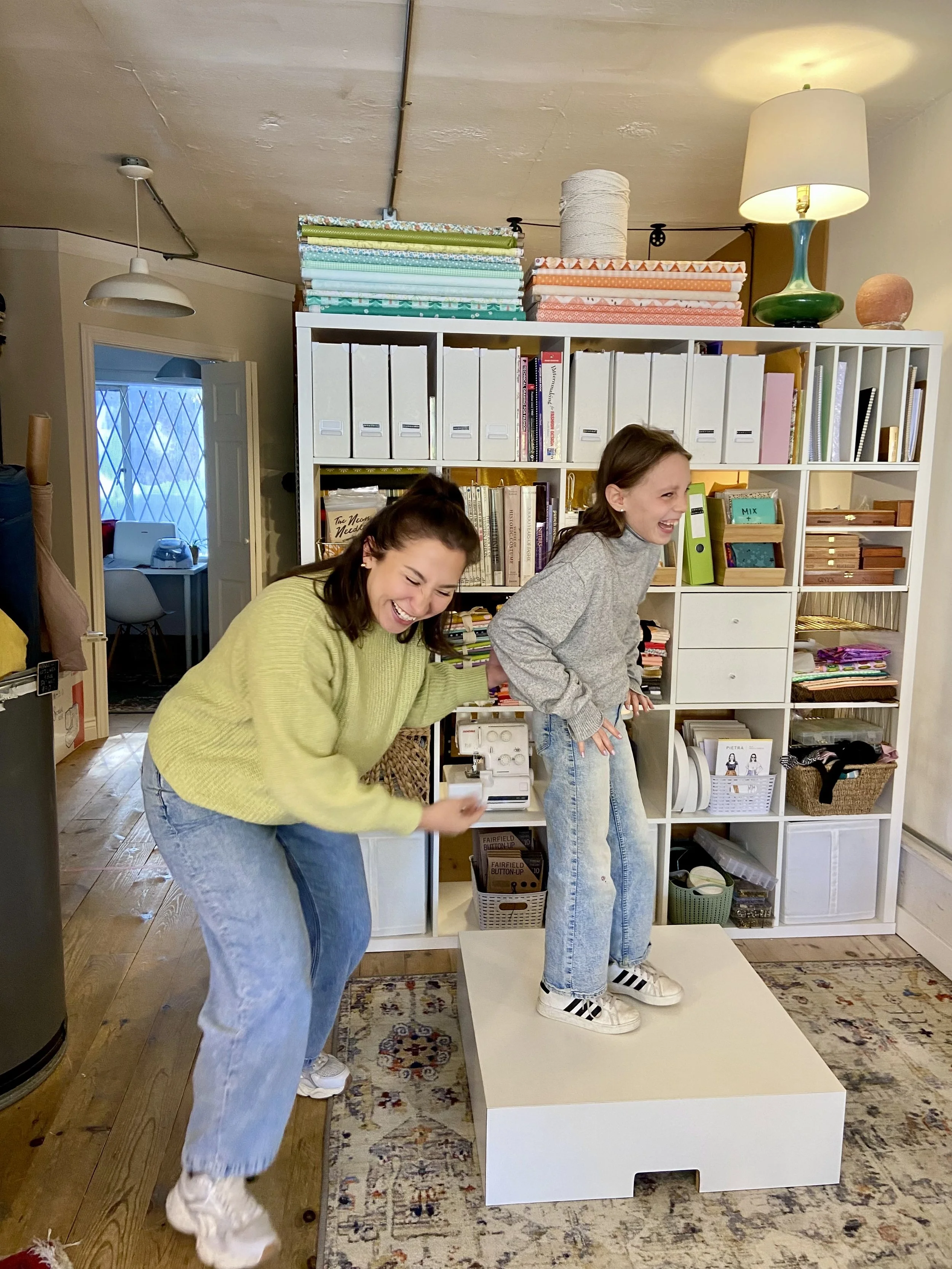 liz and student laughing in kids class