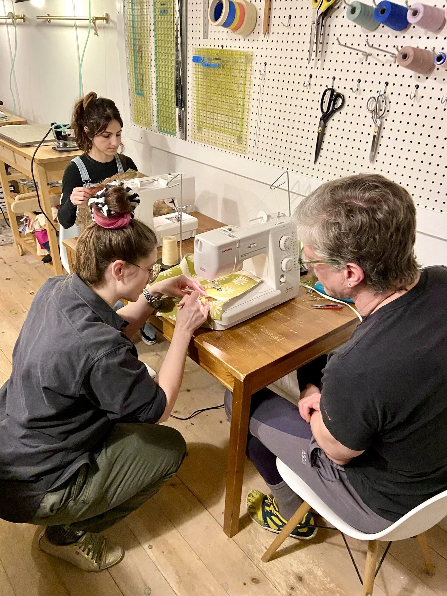 Sarita helps a student with her unique quilt project.