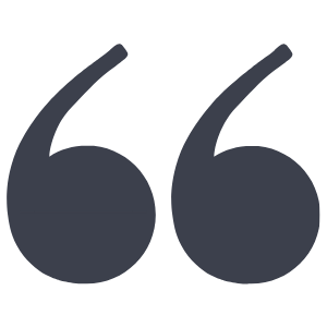 Large quotation marks in dark gray on a white background.