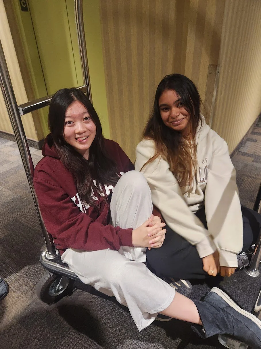 Rishika and I riding the suitcase trolley! 🧳🛒