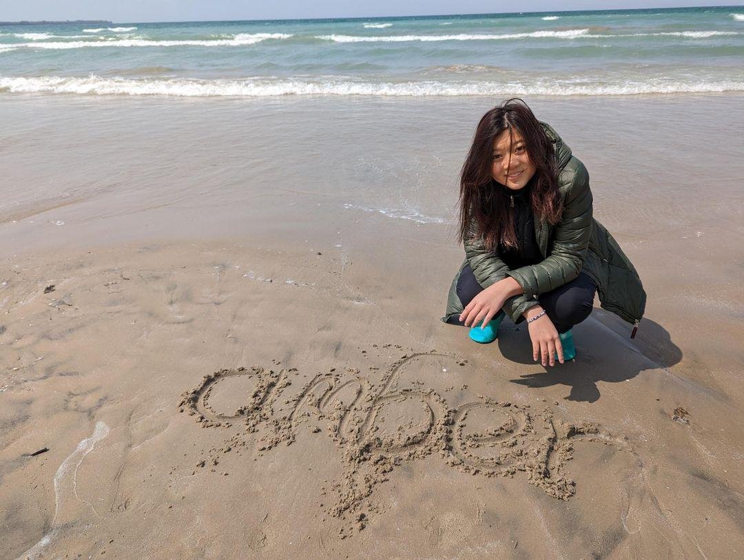 Amber MAKES HER MARK on uncharted beach territory.