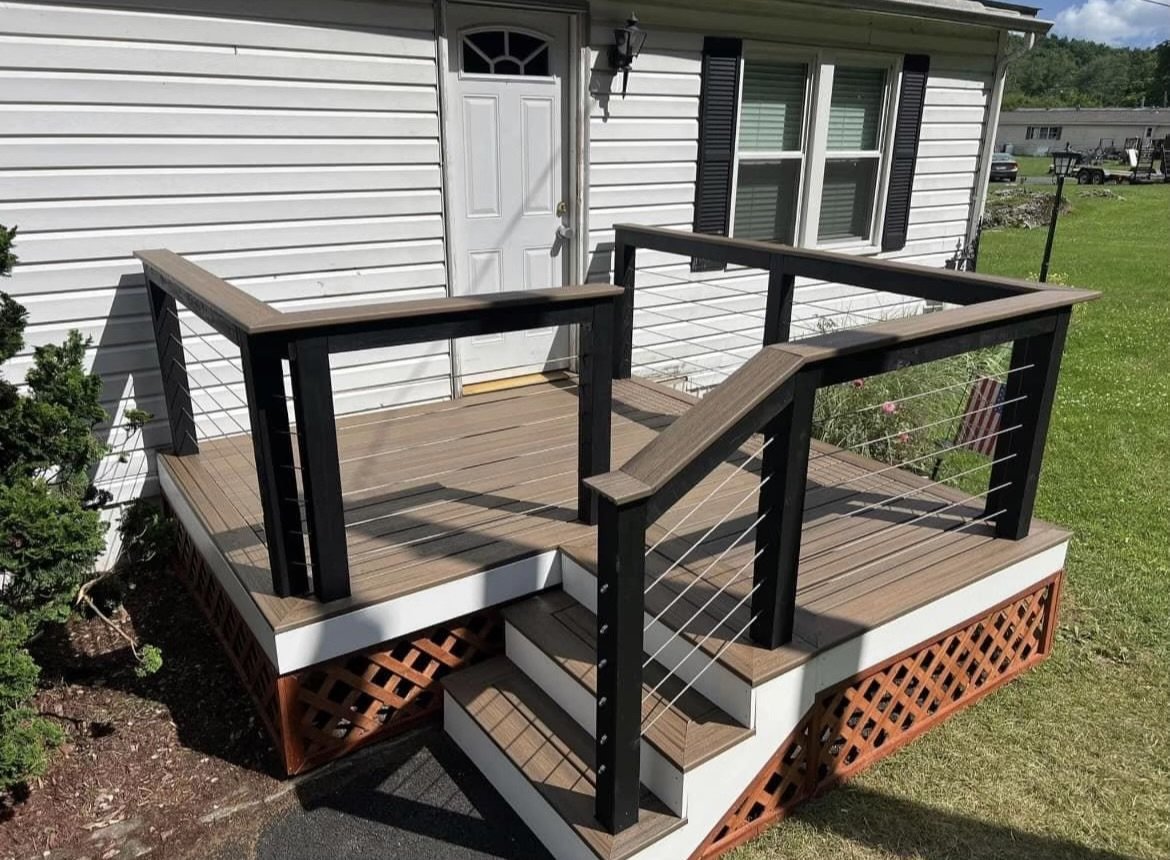 Trex Toasted Sand porch, with stainless steel cable rails and stained lattice.