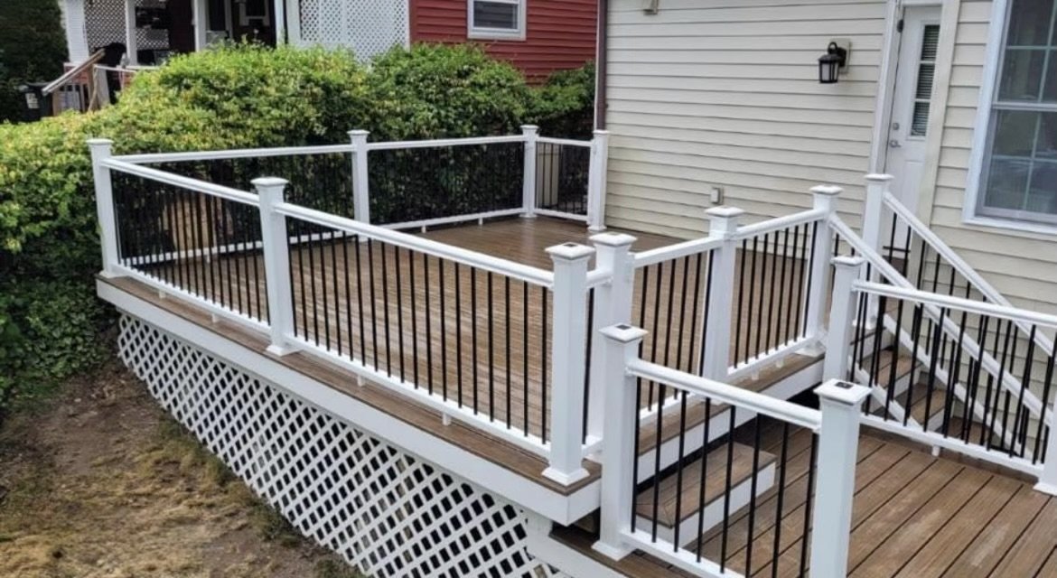 Trex toasted sand deck with white composite rails.