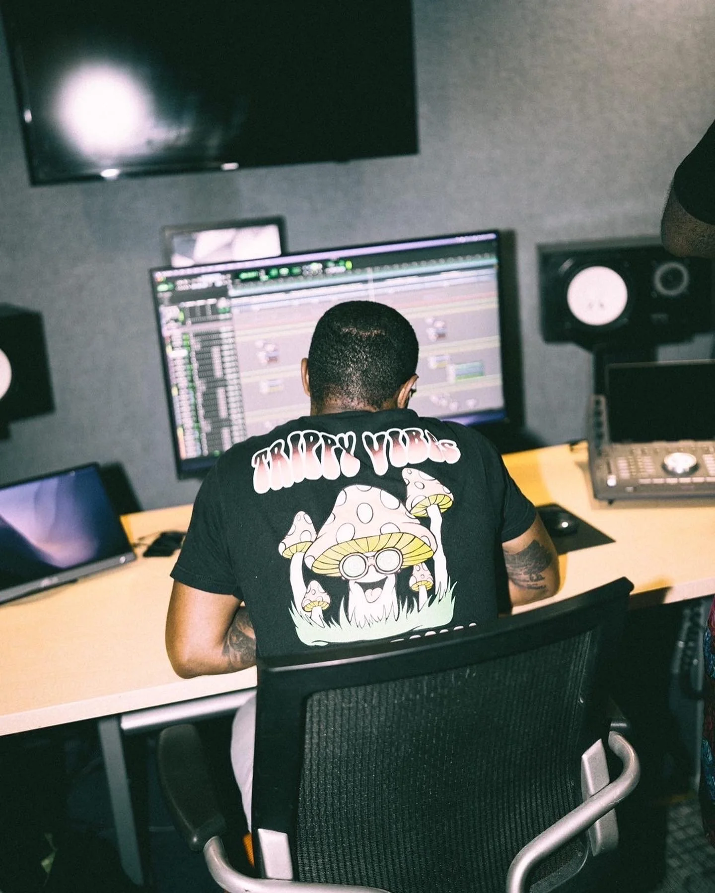 Laurie’s customers, Mariana and Carmen holding hands on a green lawn on their wedding day.