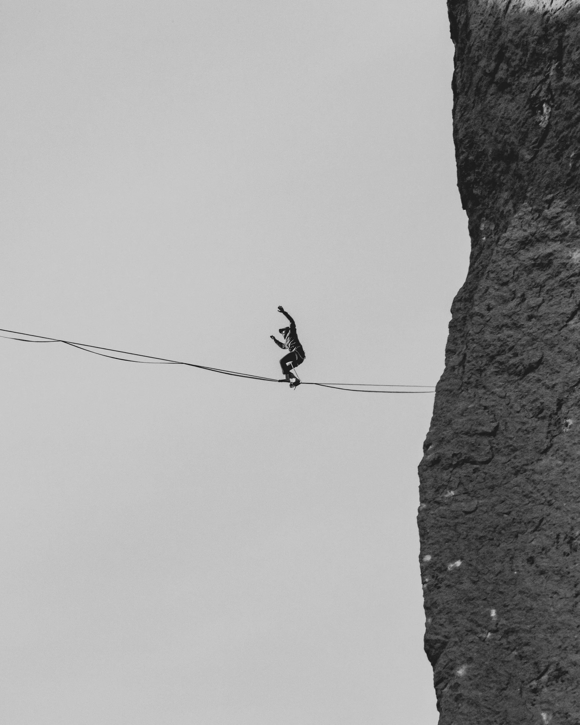 person on a high wire with no net