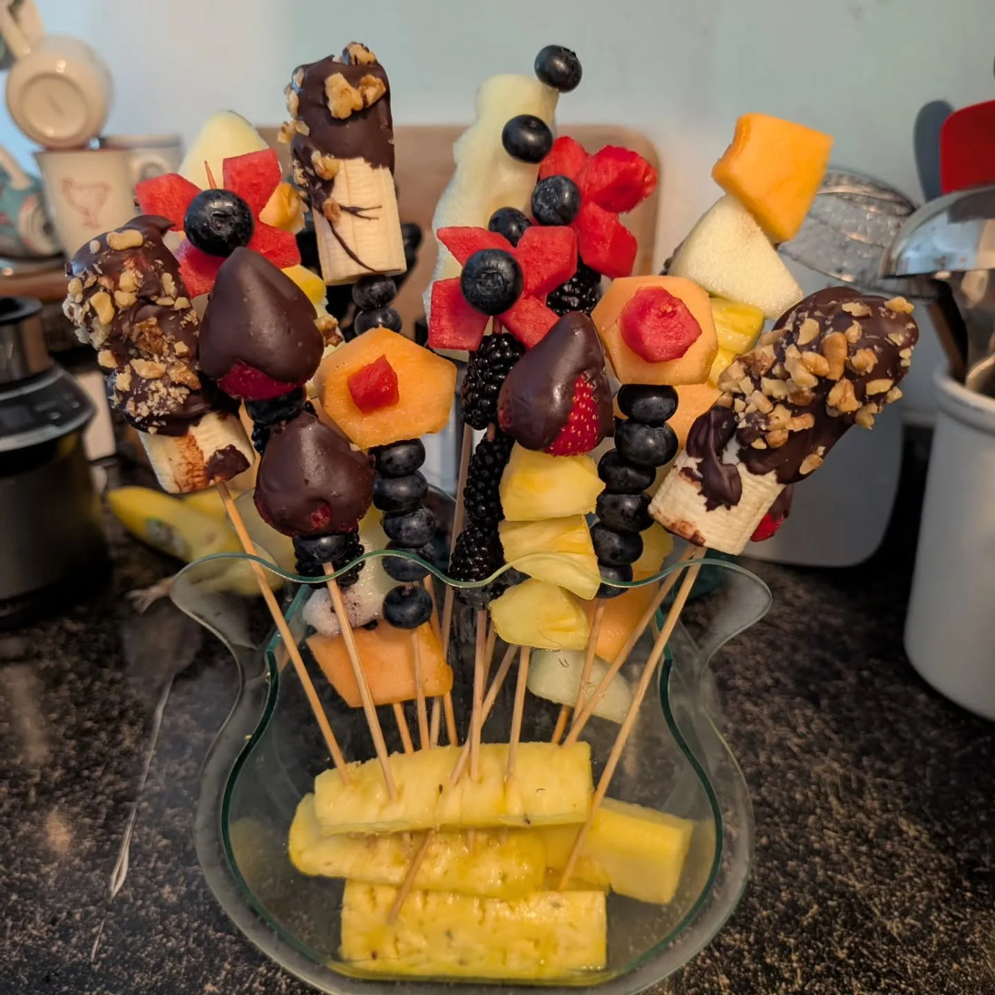 The 4th anniversary is apparently flowers and fruit... So we made our own edible arrangement 😳🤣💐🍌🍉🍓🥝