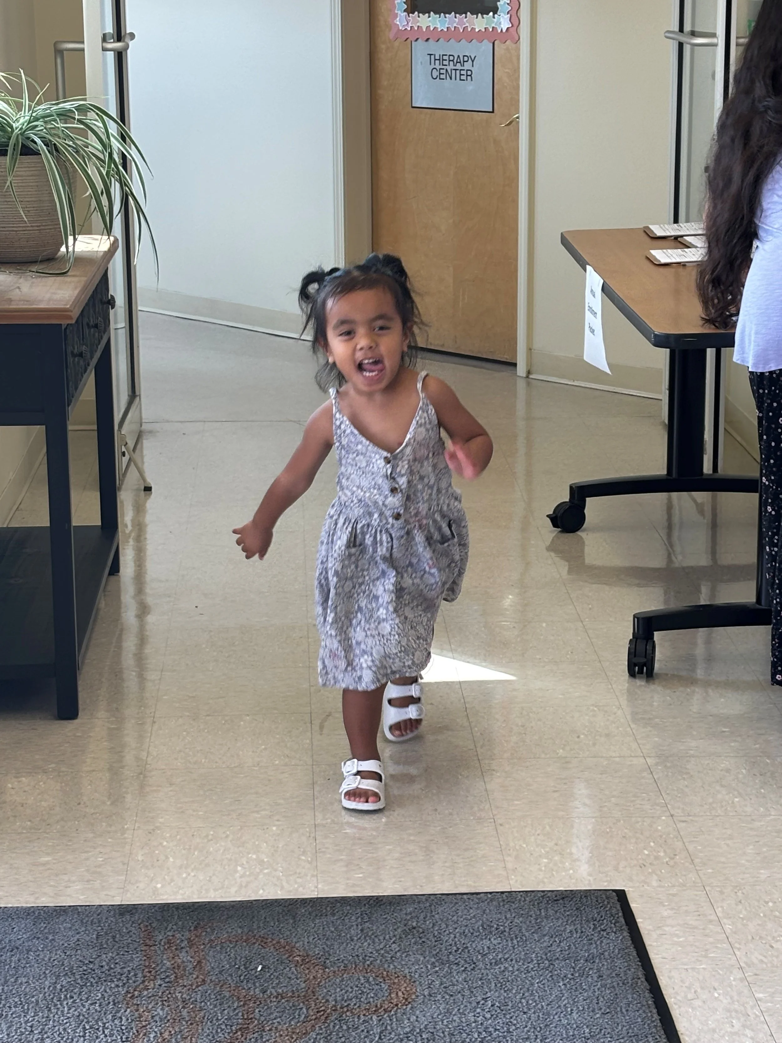 Berryville little girl running August 2025.jpg