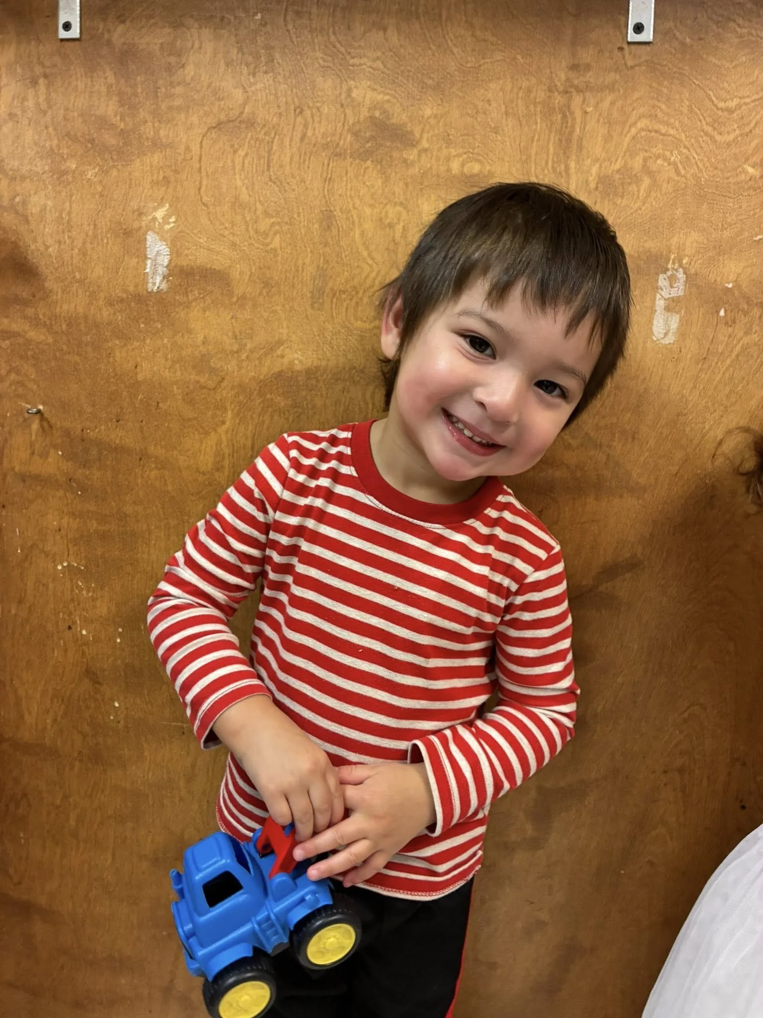 BV 2026 Boy holding toy truck.jpg